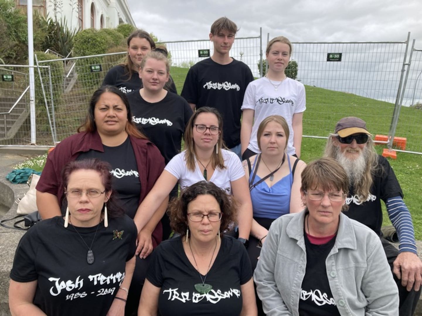 Joshua Terrey's family, including his father Peter Terry, far right, outside the Hamilton District Court after the sentencing of Akasha Kaihana-King in November last year. Photo / Belinda Feek