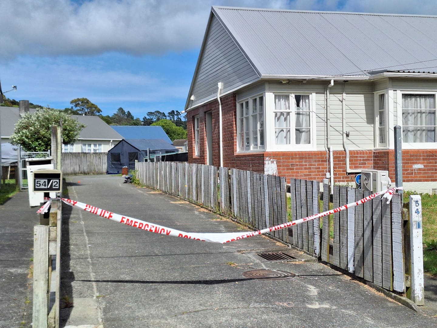 Police have cordoned off a property on Seddon St in Naenae. Photo / Melissa Nightingale
