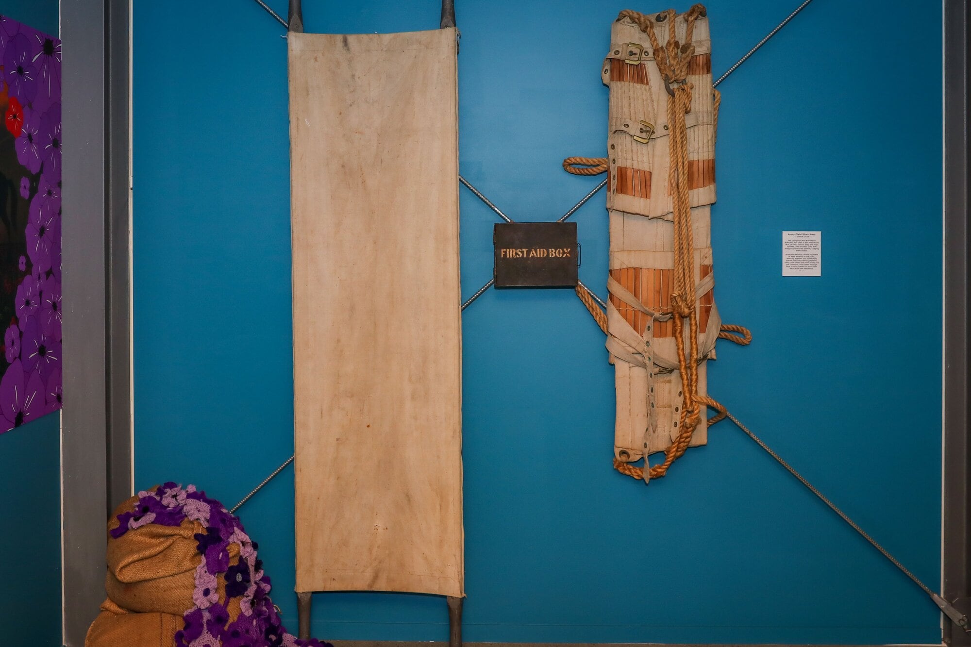  Army field stretchers and a first aid box from the world wars. Photo / Kelly O&rsquo;Hara