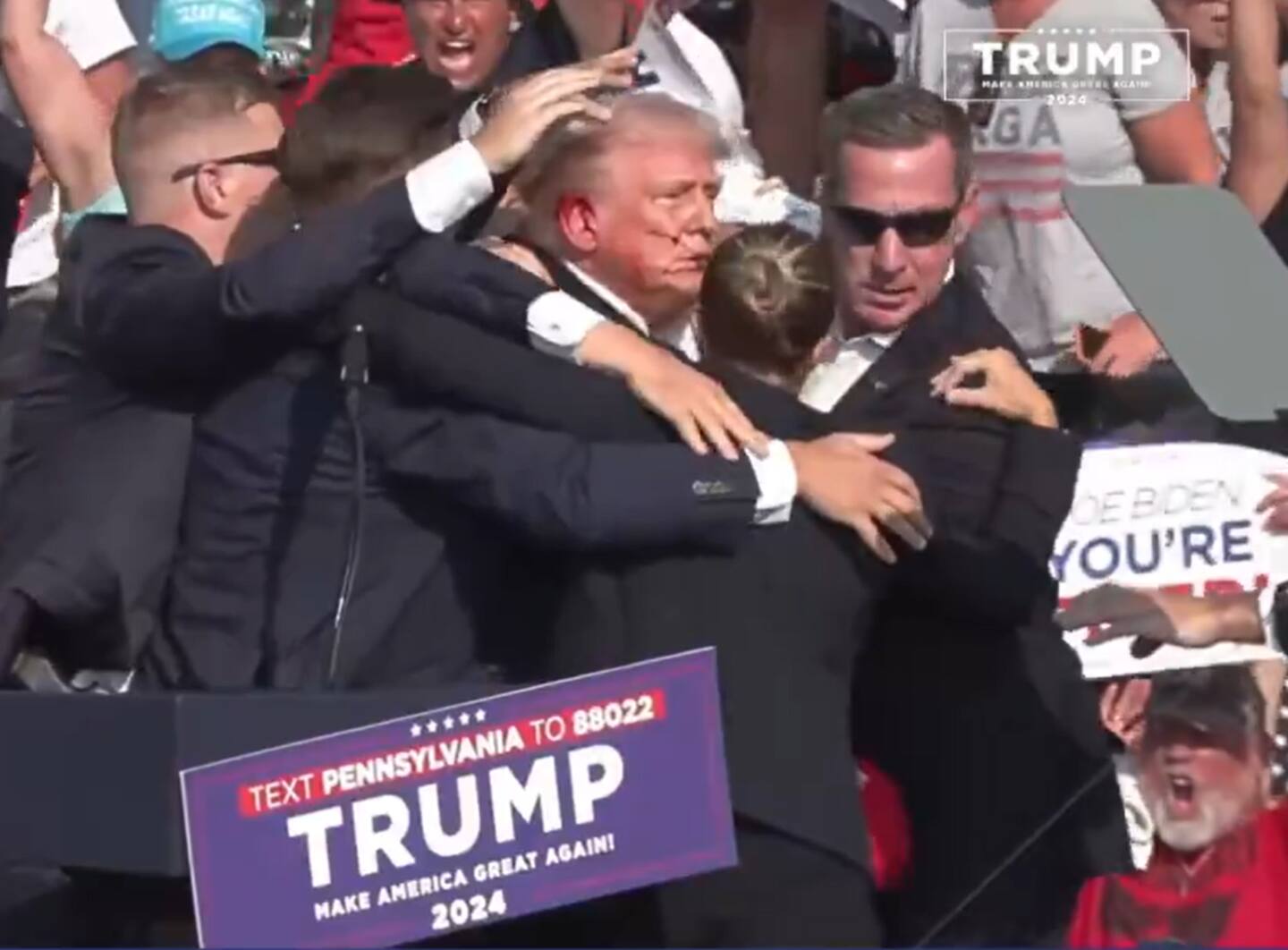 Blood could be seen near Donald Trump's ear as he was rushed from the stage at a Pennsylvania rally.