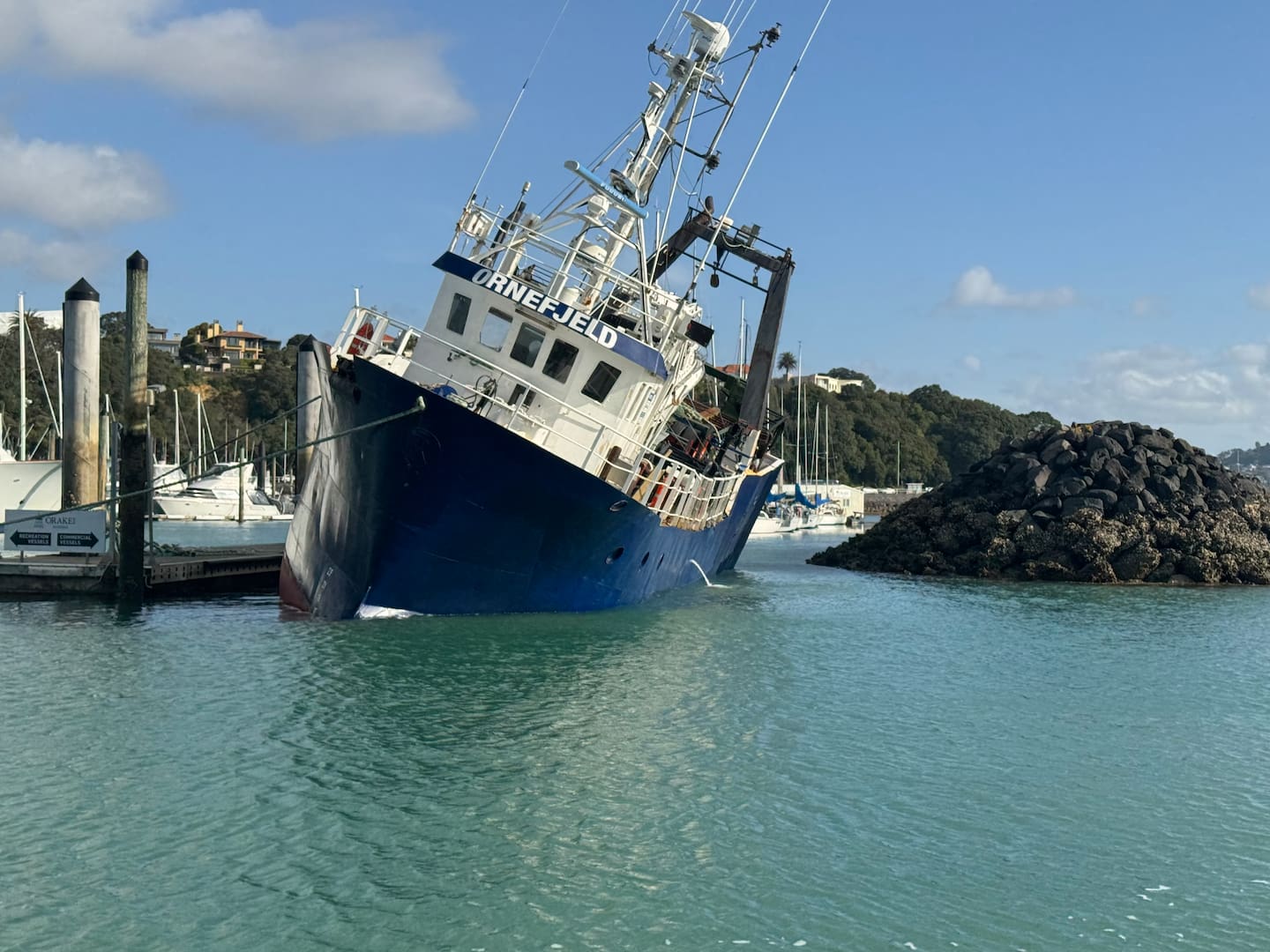 The vessel's skipper was allegedly having a cup of tea at the marina and missed tide timings to depart. Photo / Grant Lamont