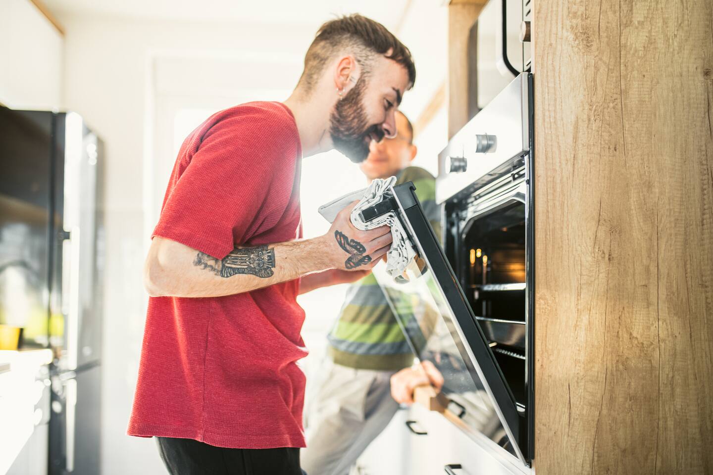 Fat splatter can polymerise on the surface of the oven, making it difficult to clean. Photo / Getty Images