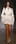 A model wears a creation by Jil Sander. Photo / AP