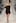 A model wears a design by Jimmy D as part of the Little Black Dress show. Photo / Getty Images