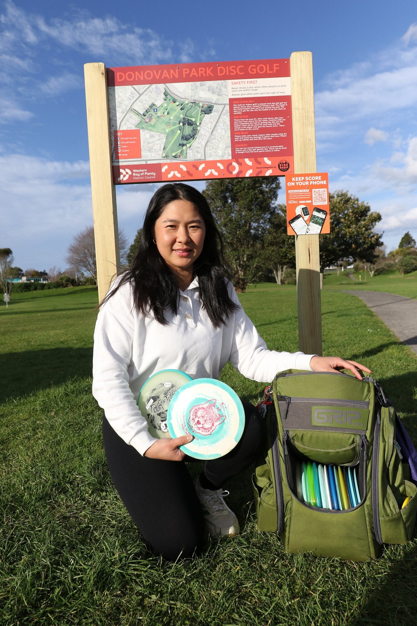 Disc golf player Jiang Yu at the start of the nine-hold disc golf course that is now open at Donovan Park. Photo / Stuart Whitaker