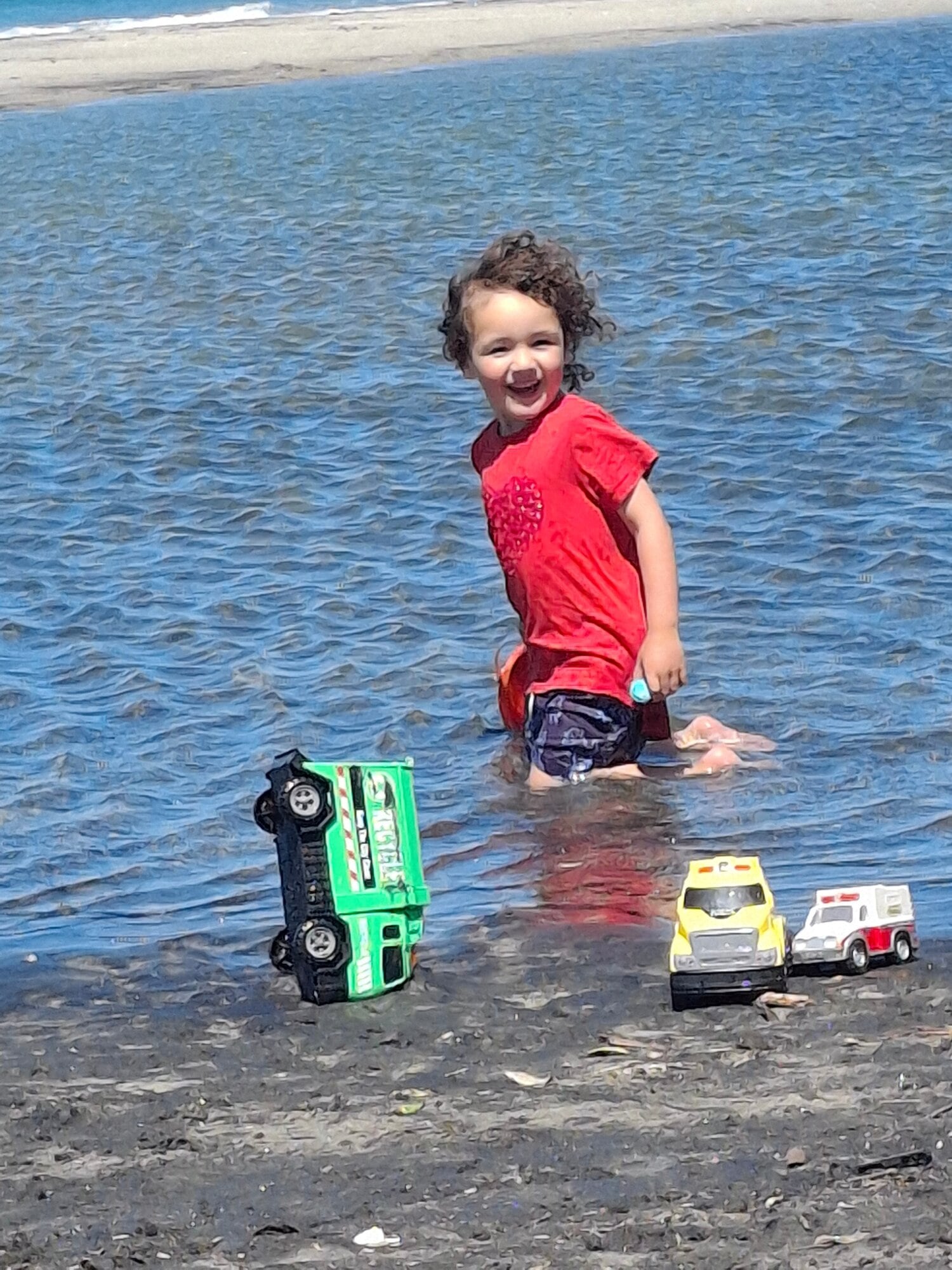 Photograph of Winitana Gabb, 3, on a visit to Waihī Beach with Grandma and Grandad won third place. Photo / Megan Taylor