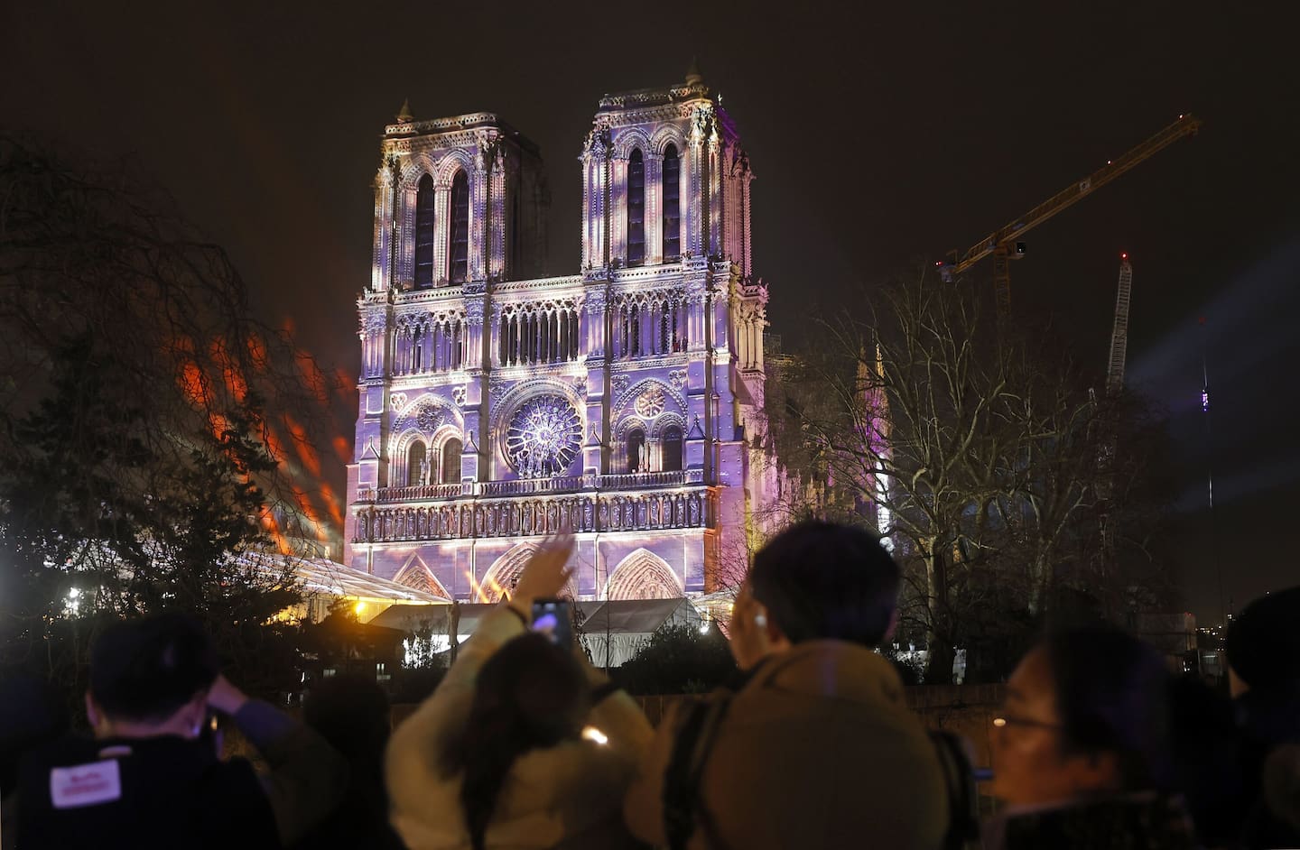 A sound and light show was projected on the facade of the Notre-Dame de Paris cathedral on the eve of its reopening to the public. Photo / Getty Images