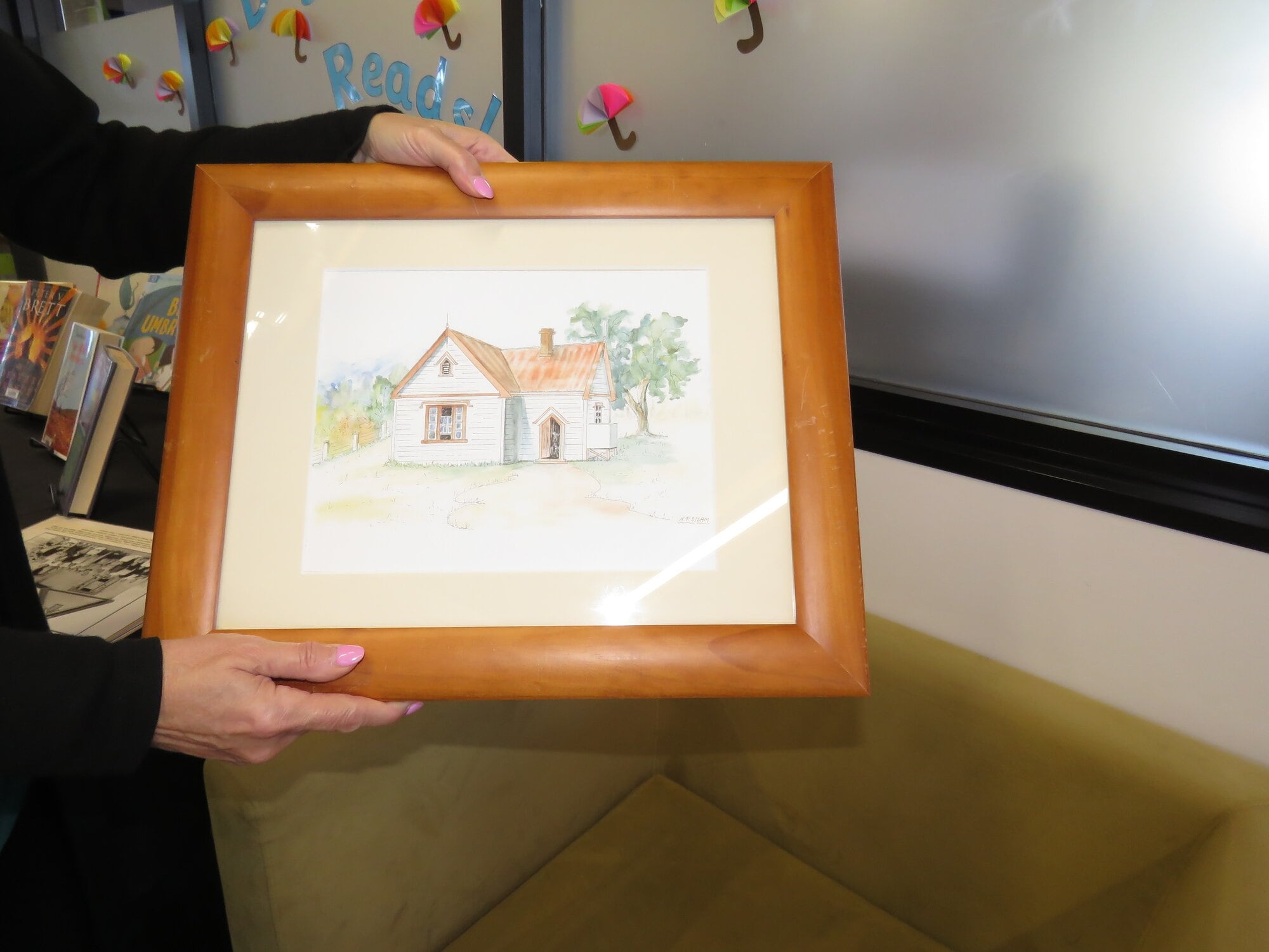 The framed painting by artist Roy Cunliffe of the No.3 School on Walkers Rd. Photo / Merle Cave