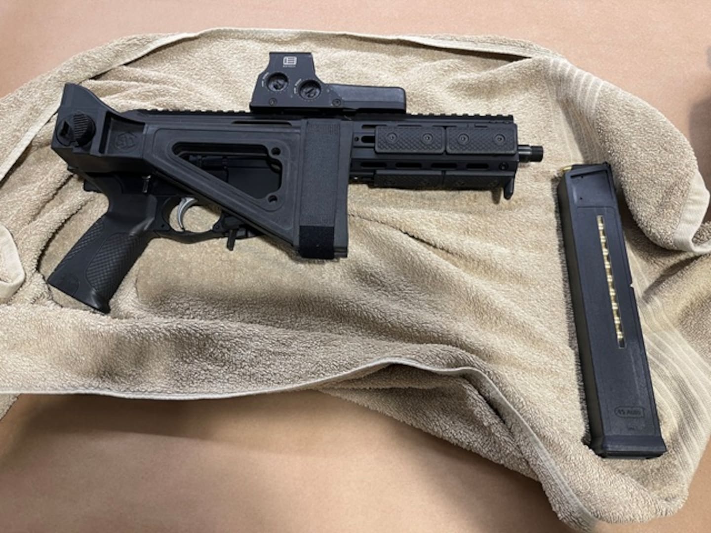 The guns were stashed inside a suitcase in an upstairs bedroom of an Airbnb. Photo / New Zealand Police