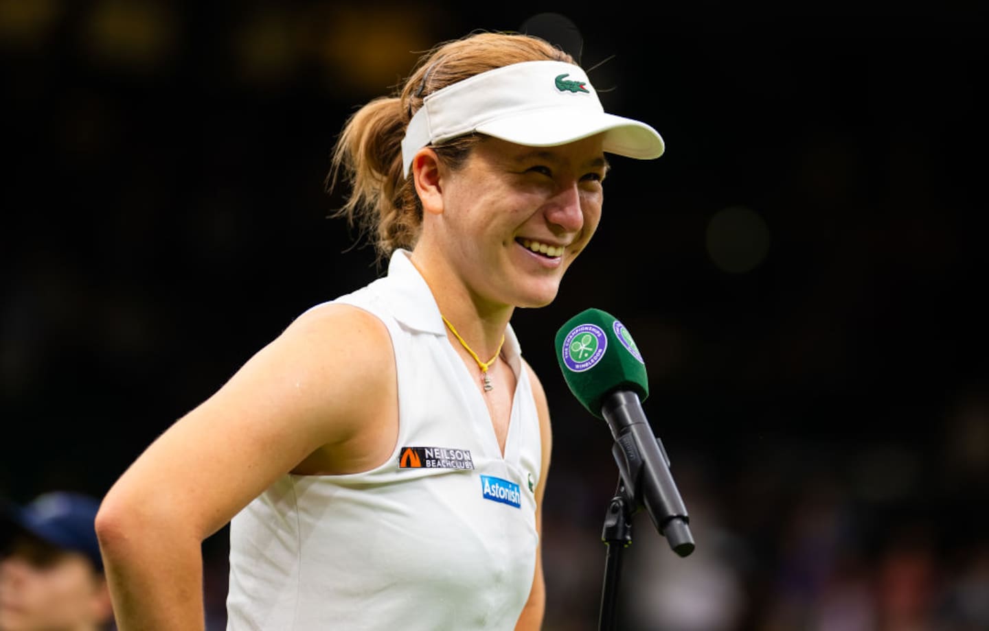 Lulu Sun of New Zealand during her post-match interview after defeating Emma Raducanu in the fourth round at Wimbledon. Photo / Getty Images