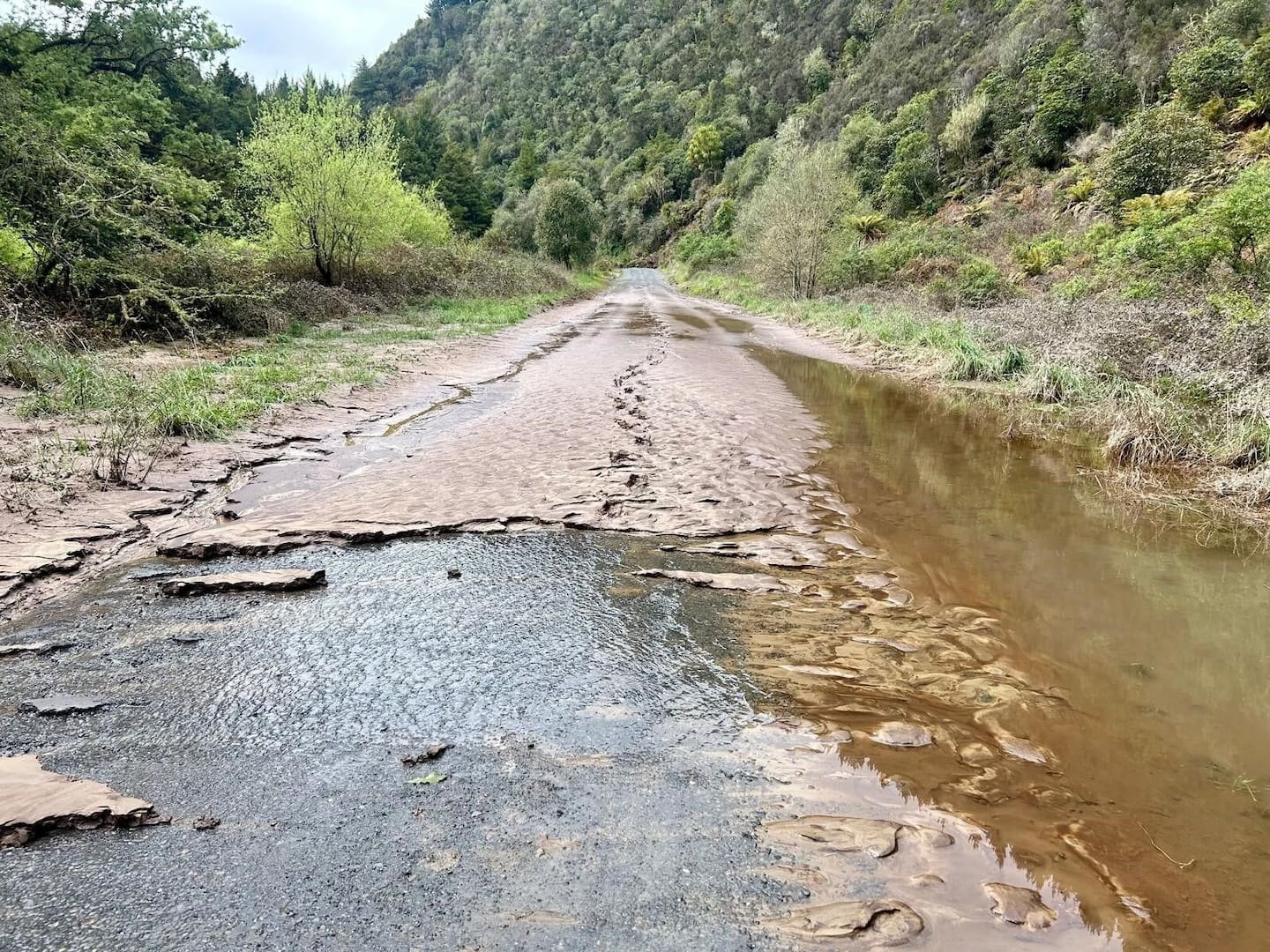 Ōngarue Stream Rd is one of six local Ruapehu roads yet to fully reopen after October's flood event. Flooding has left behind heavy silt deposits and multiple slips that still need to be cleared.