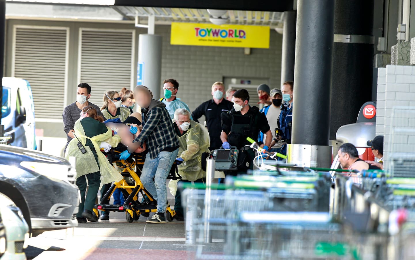 First responders rush one of the Countdown LynnMall terror attack victims to hospital in September 2021. Photo / Alex Burton