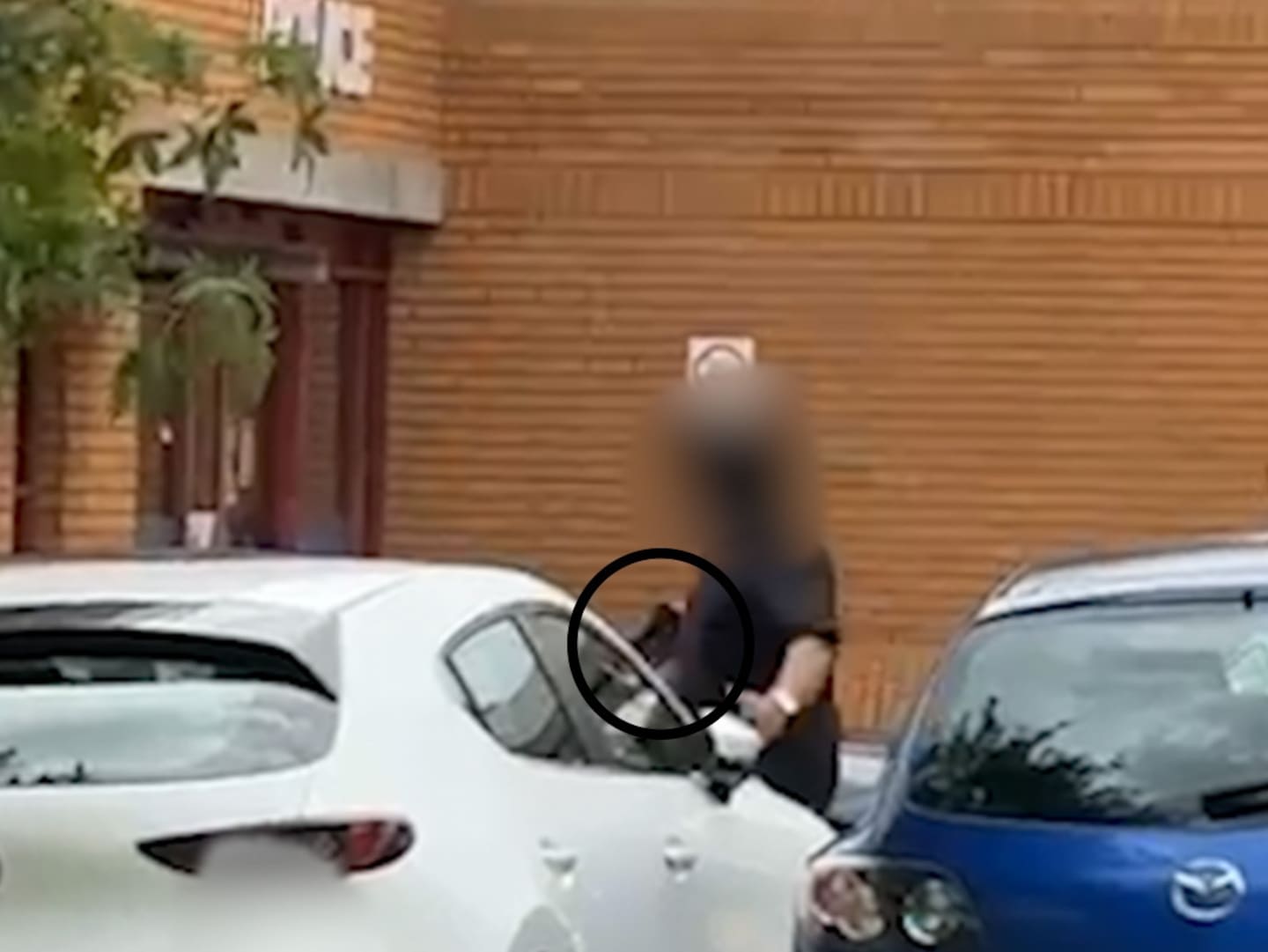 A gunman at the centre of a West Auckland rampage is pictured moments before being shot by police outside the Henderson Police Station. Photo / Supplied