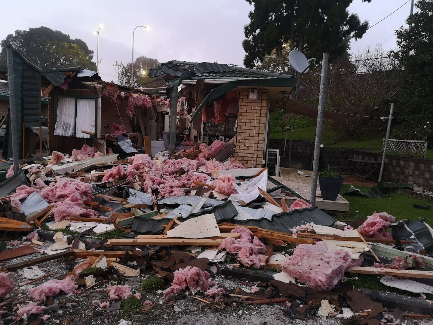 Jim Beniston's house was damaged by a speeding airborne car. He wants the Council and police to take action before someone is hurt. Photo / Supplied