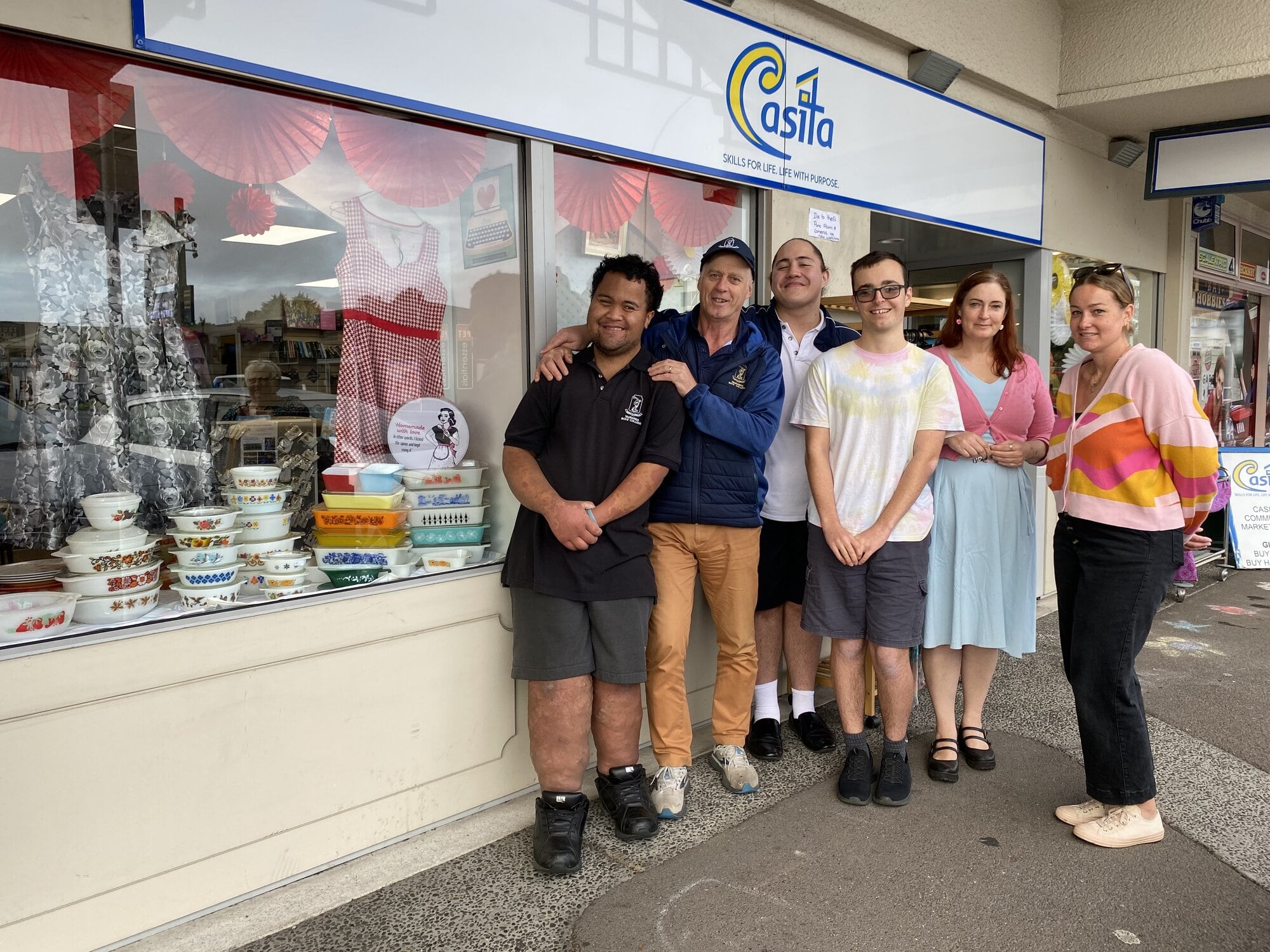 The Casita team outside one of their colourful windows. Photo/Rosalie Liddle Crawford.
