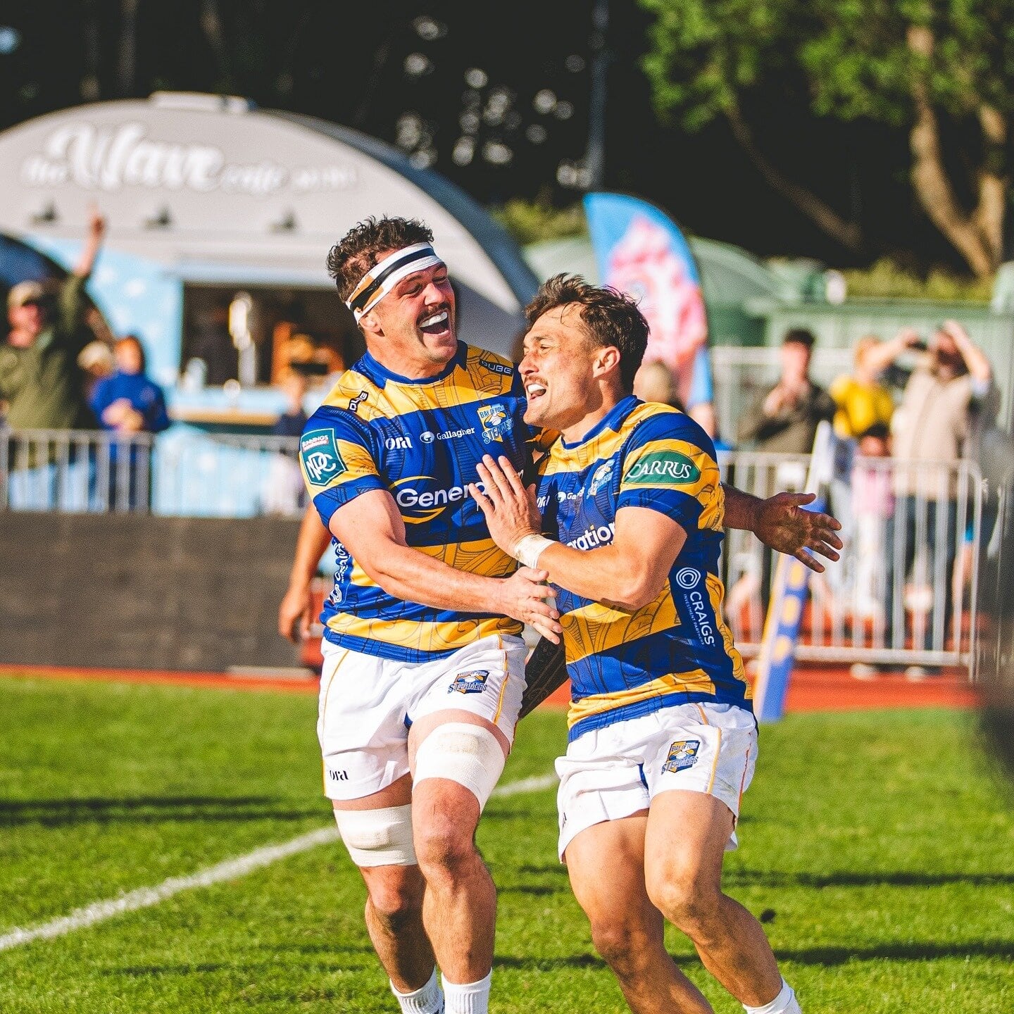 An elated Joe Johnston congratulating teammate Cole Forbes on his try against Tasman at Tauranga Domain. Photo / Bay of Plenty Rugby Union