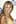<b>2000</b><p>Before she was Queen Bey, Beyoncé was one-third of popular late 1990s girl group, Destiny’s Child. Flanked by fellow singers Kelly Rowland and Michelle Williams, Beyoncé dipped herself in body glitter at the 9th annual MTV Movie Awards in 2000. Baby lights, pencil thin brows and generous helpings of lip gloss were all popular red carpet beauty choices among celebs at the time.<p>Photo / Getty Images