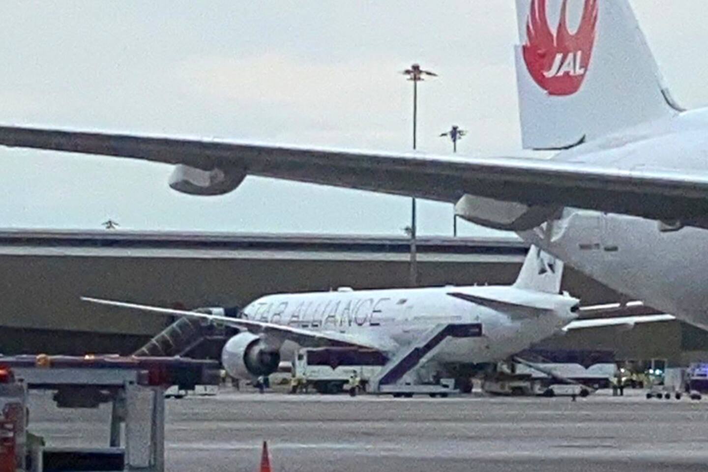 The Boeing 777-300ER aircraft of Singapore Airlines, flight SQ321 from Heathrow is seen on tarmac after requesting an emergency landing at Bangkok's Suvarnabhumi International airport. Photo / via AP