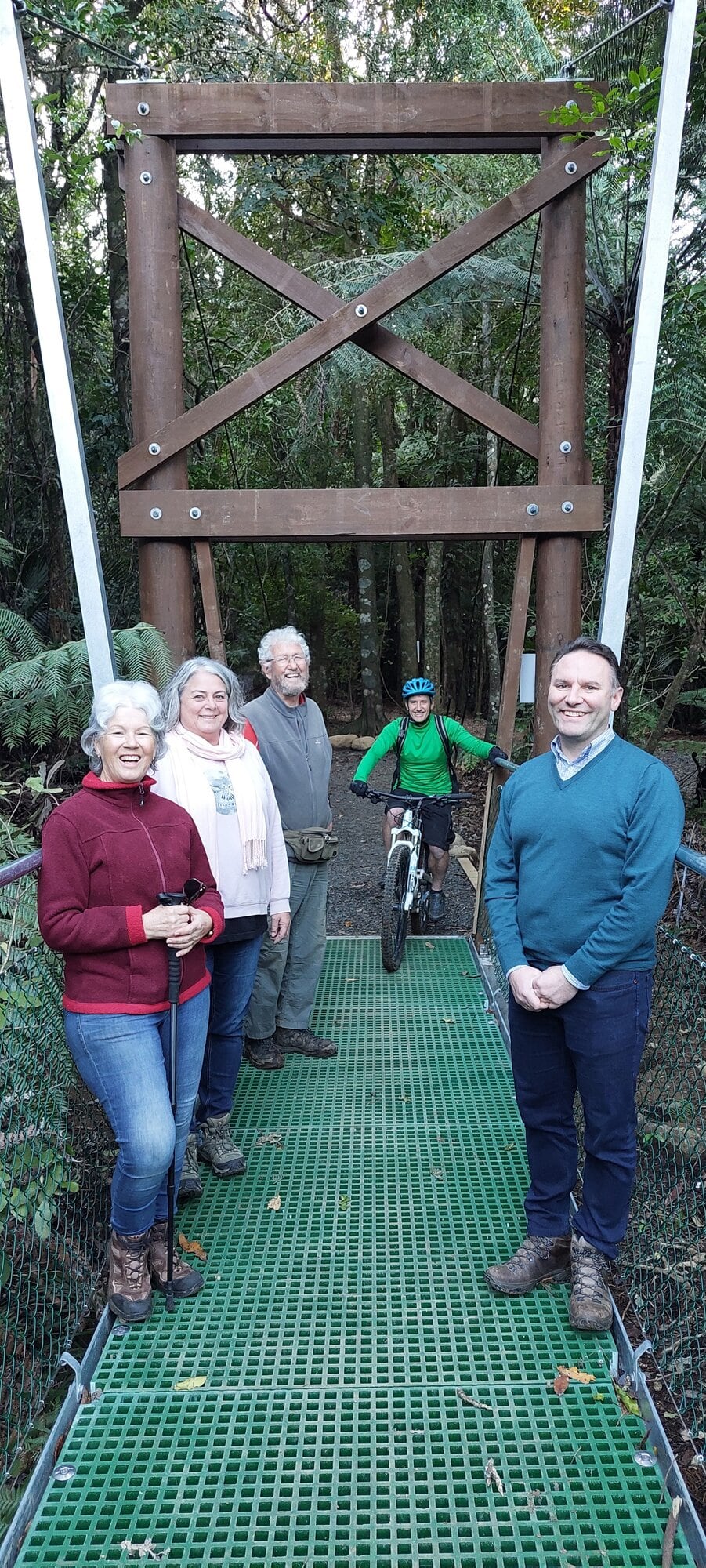  Katikati Recreational Park Development Group’s Jill Jackson, Jacqui Knight, Lawrie Macdonald, Damon McLachlan and Western Bay Mayor James Denyer on the new bridge. Photo / Supplied