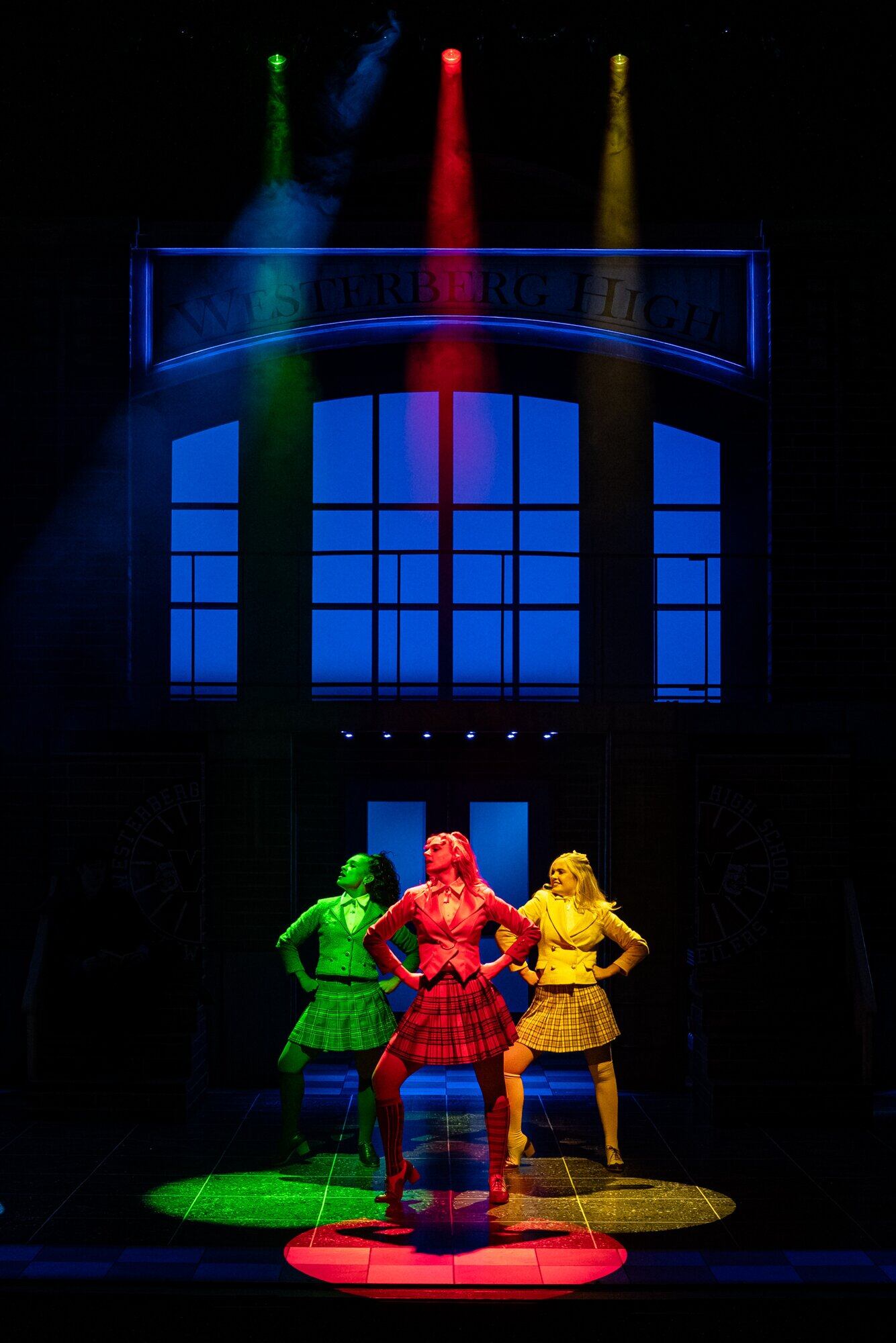  Calista Nelmes, in red, as queen bee Heather Chandler in Heathers The Musical which is being performed in Christchurch, Wellington and Auckland. Photo / Supplied