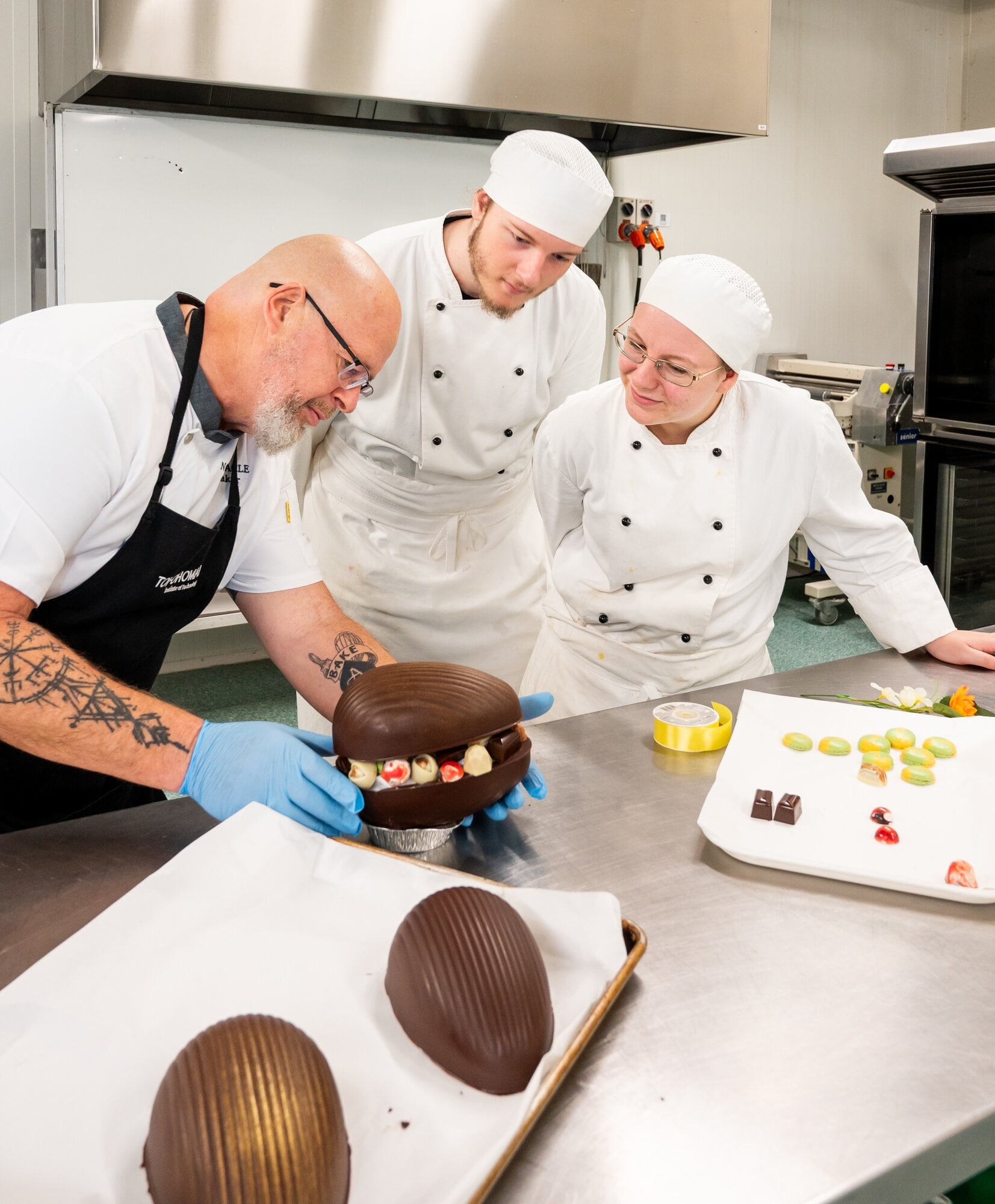 Noel Remacle sharing his knowledge with Ollie Hancock and Amelie Harrison Noel Remacle sharing his knowledge with Ollie Hancock and Amelie Harrison, at Toi Ohomai. Photo / Brydie Thompson
