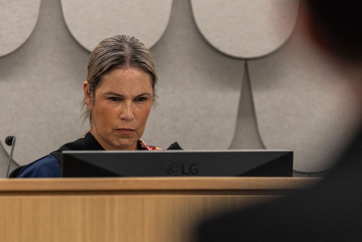 Coroner Erin Woolley.