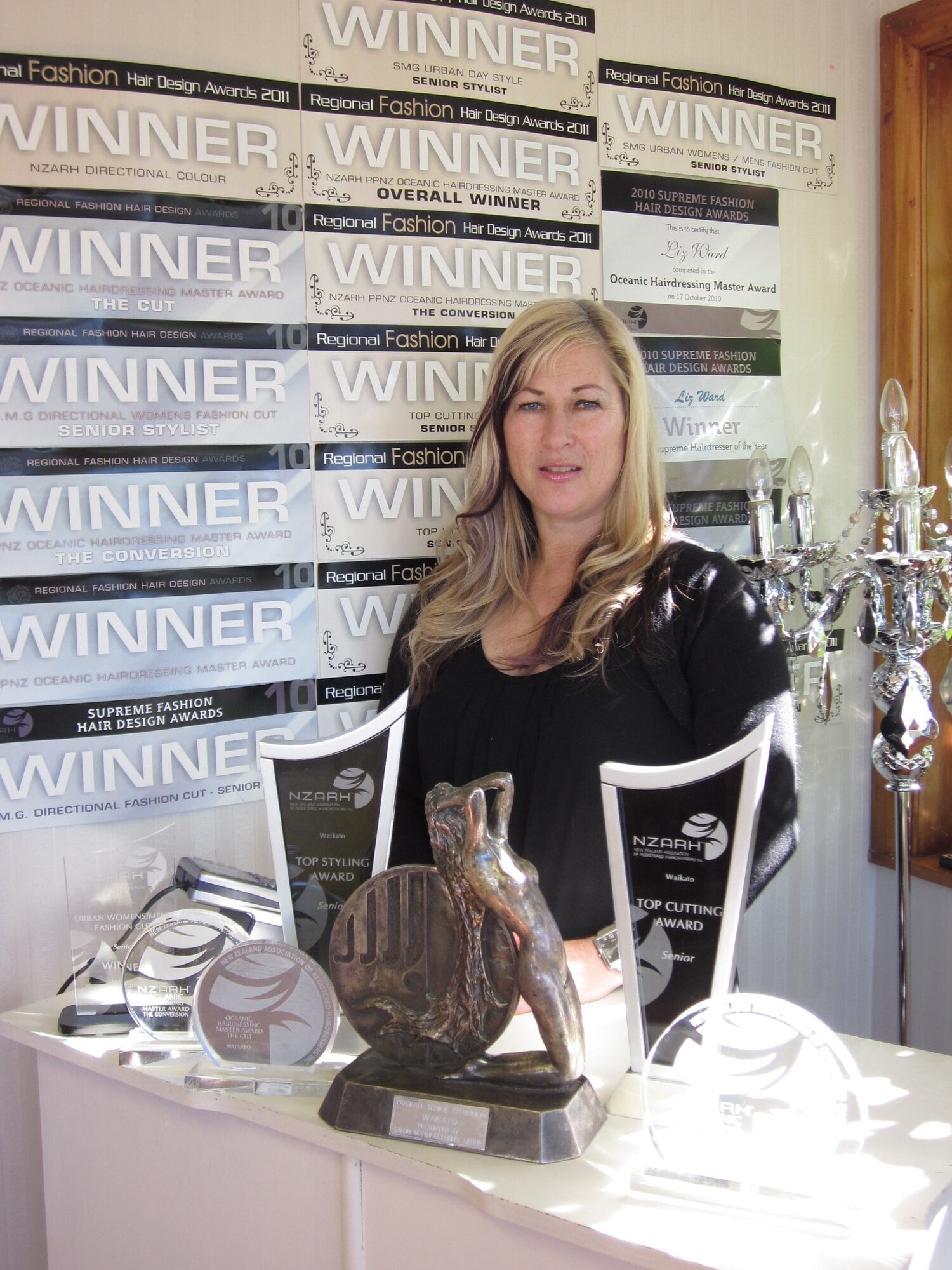 GOLDEN GIRL: Liz Ward who has added to her mounting stash of trophies. Liz Ward, pictured in 2012, adding to her mounting stash of hairdressing trophies. Photo / File