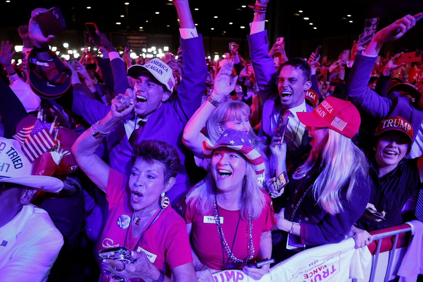 Supporters react as Fox News projects Donald Trump is elected president. Photo / AFP