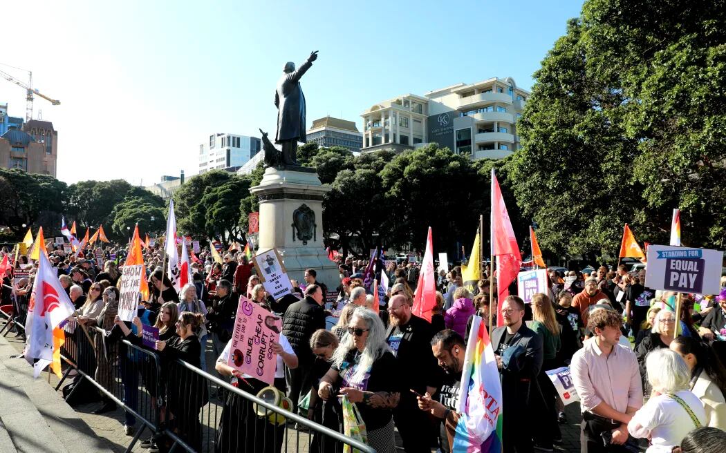 Pay equity protesters voice their opinions outside Parliament in May. Photo / RNZ, Marika Khabazi