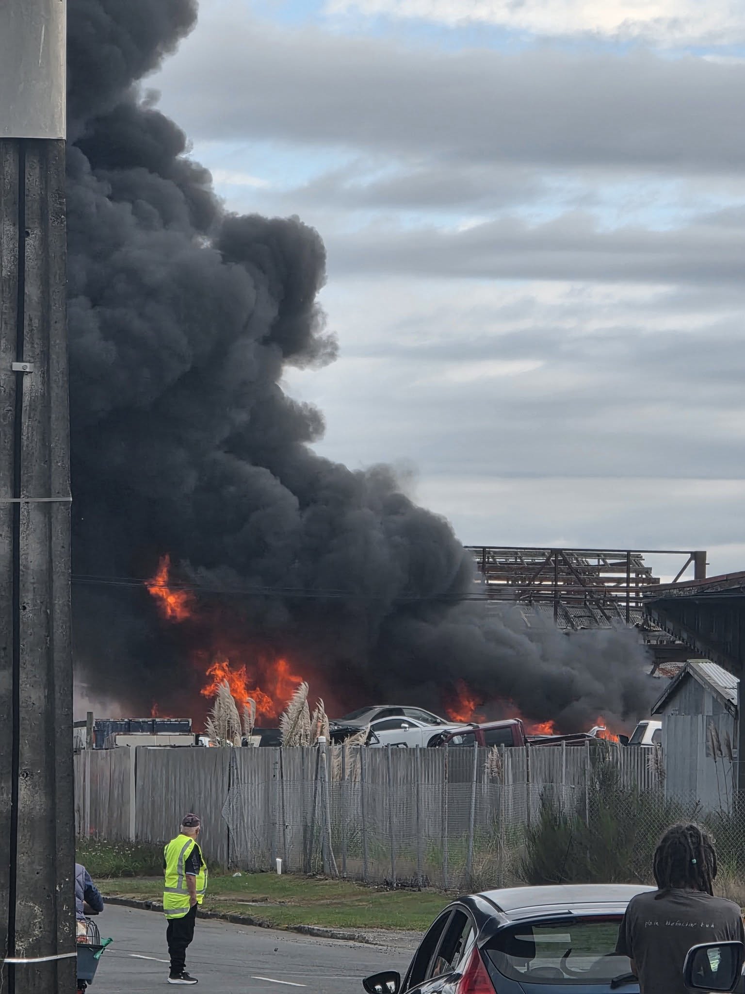 The car wreckers yard in Ngongotahā was engulfed in the fire, which sent large plumes of black smoke into the air.