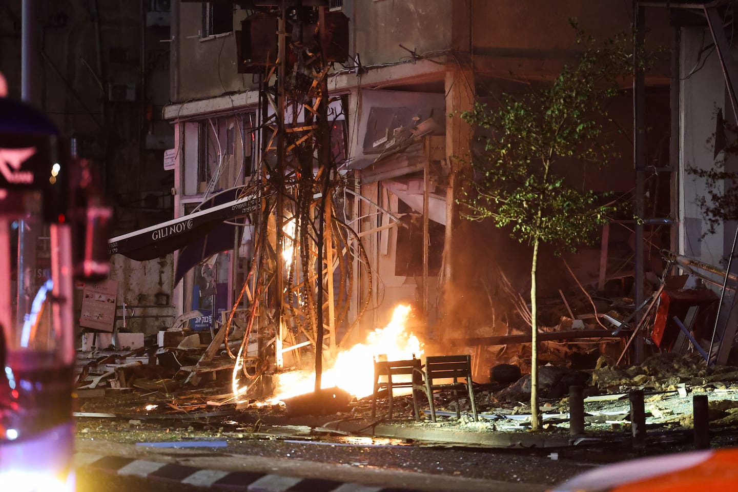 This picture shows the site of a rocket attack from southern Lebanon in Ramat Gan. Photo / AFP