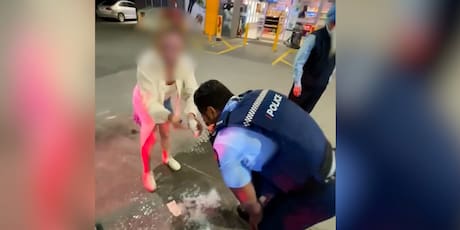 Watch: Chaos on petrol station forecourt as police officer pepper sprayed then doused in milk