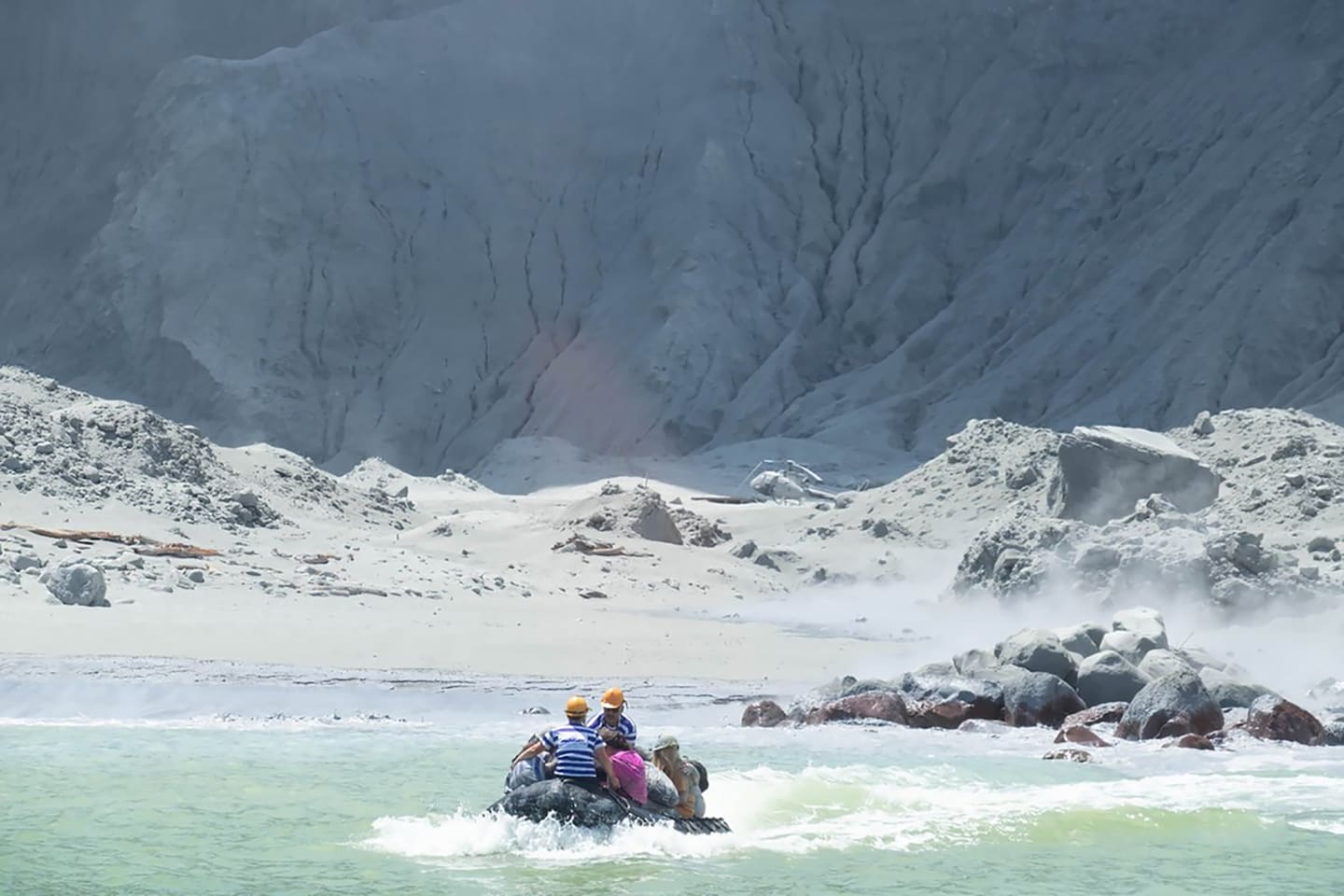 Tourists are ferried off Whakaari/White Island after the eruption. Photo / Michael Schade