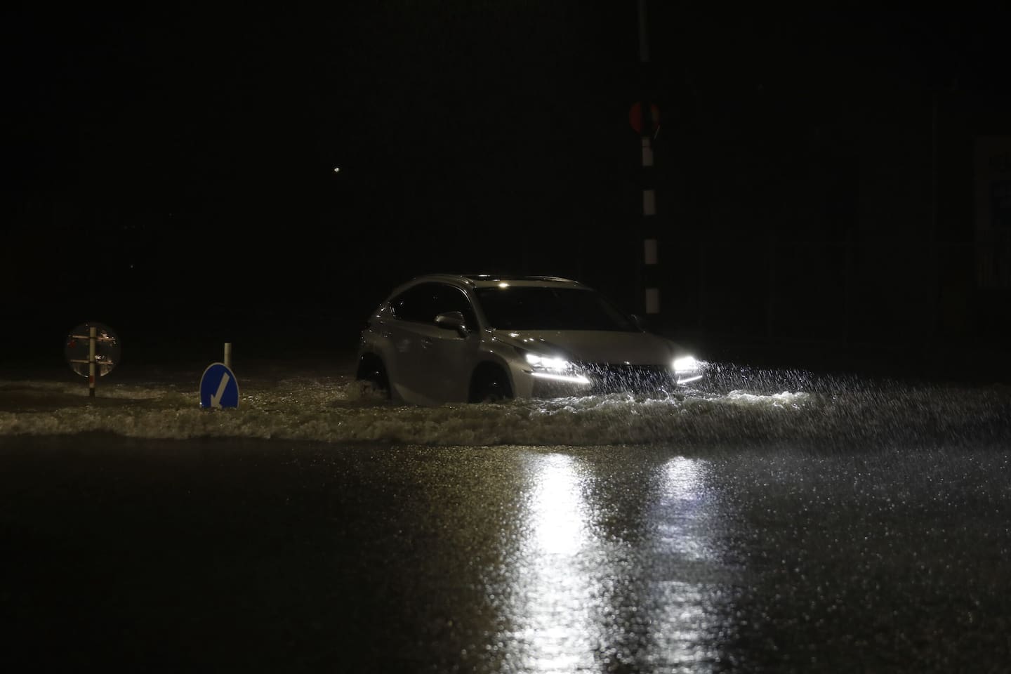 Severe flooding on Sandringham Rd in Auckland and heavy rainfall and lightning hit the city. Photo / Hayden Woodward