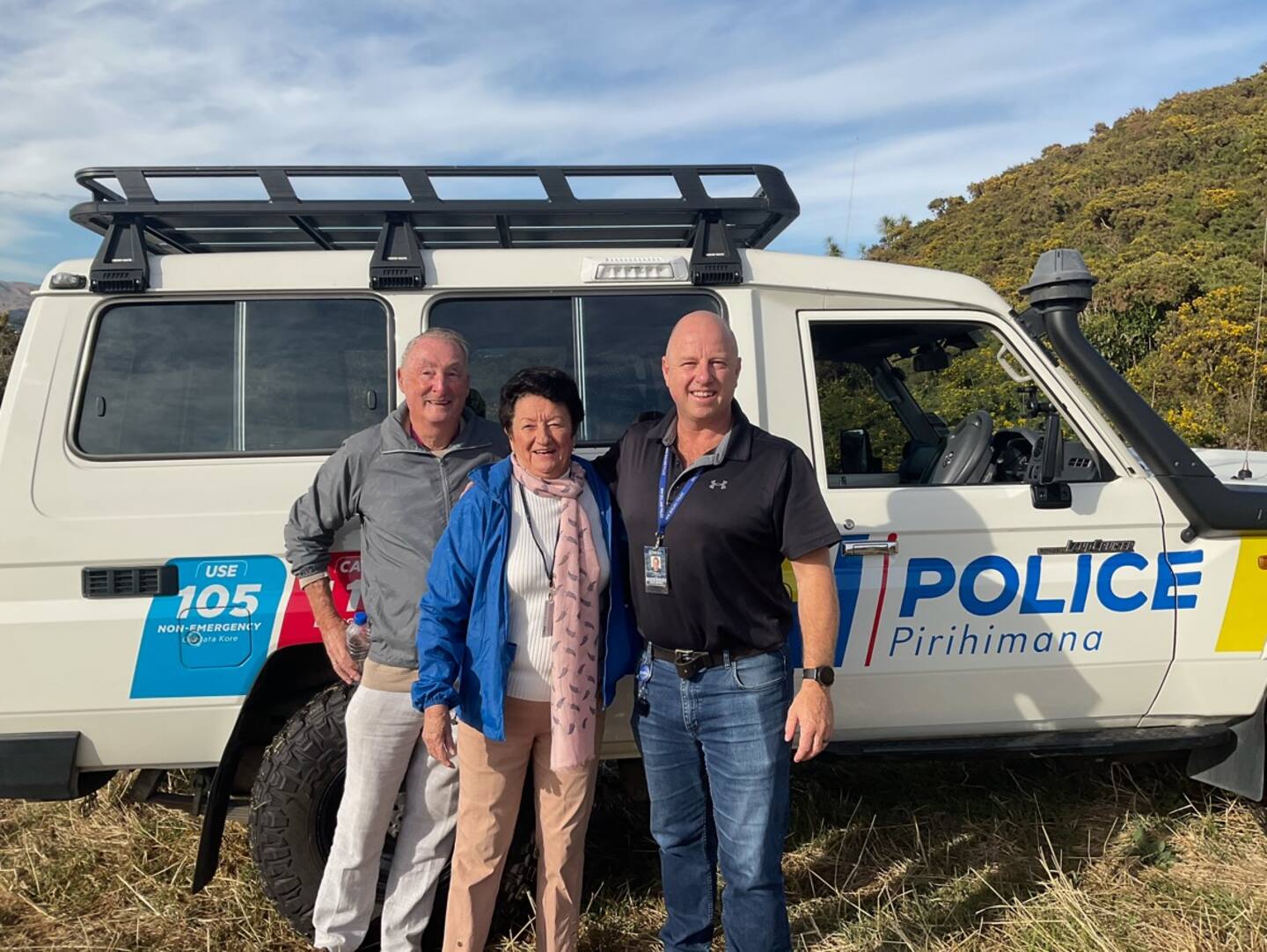 Myles Martin (left), Hilary Martin and Detective Senior Sergeant Hamish Blackburn travelled to the scene in a police 4WD.
