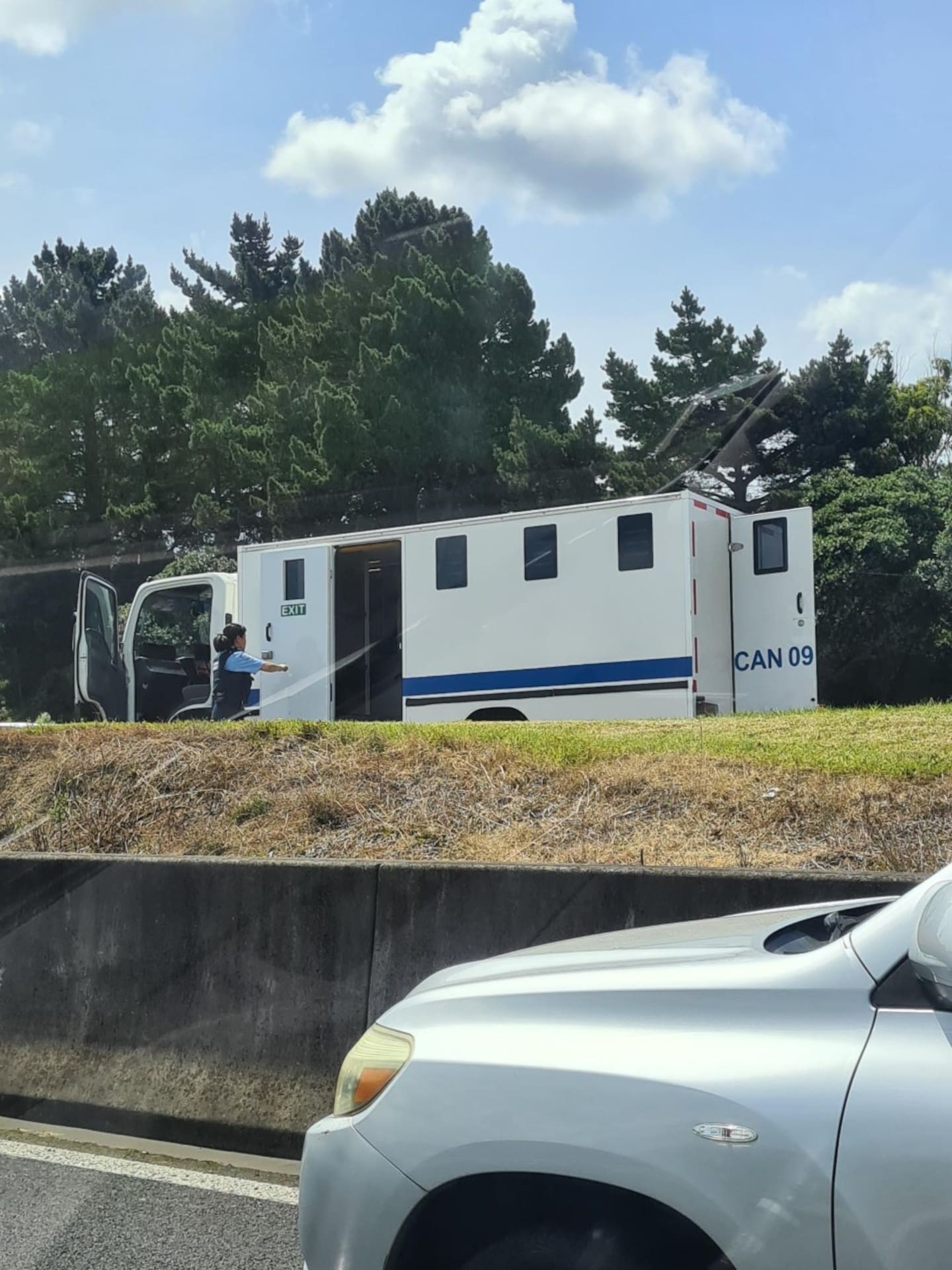 The Corrections van at the scene after the escape.