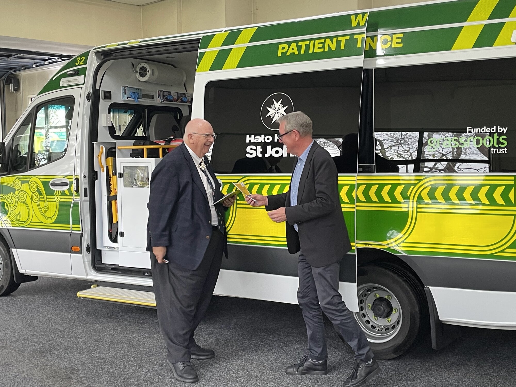 MC Ken Williamson (left) and Kevin Burgess at the vehicle dedication. Photo / Supplied