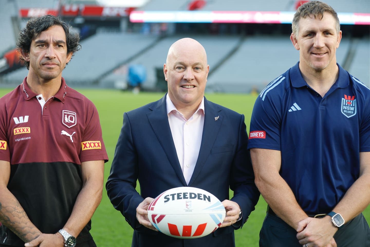 Prime Minister Christopher Luxon with former State of Origin players Jonathan Thurston (left) and Ryan Hoffman at Auckland's Eden Park. Photo / Michael Craig