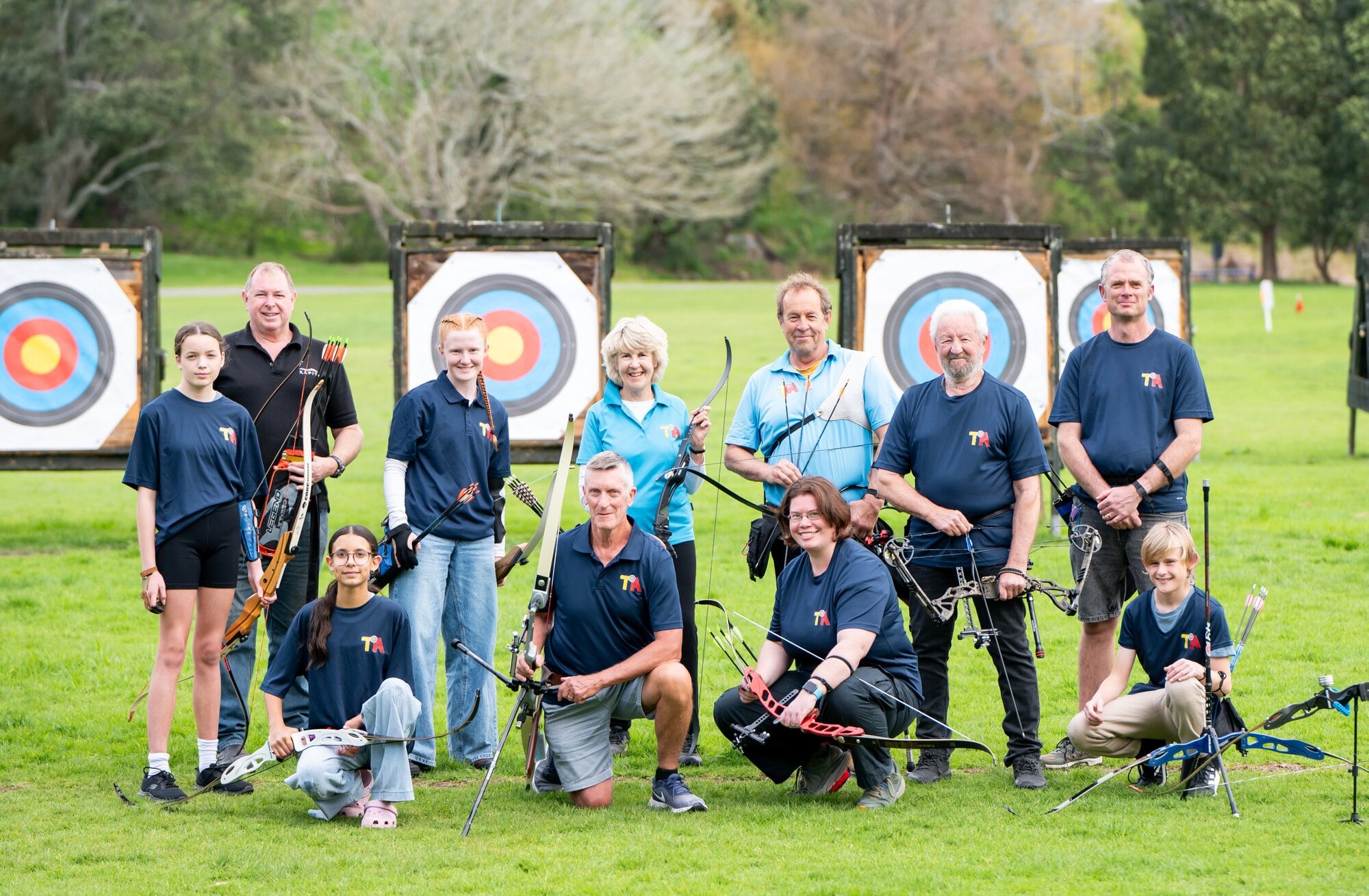 Club members (back row) Tessa Temara, David Rowe, Charlotte Hills, Jenni Donald, John Ellis, Eric Lunde, Aaron Reeve. Front row (crouching) Mariam Harrison, David Mansell, Lauren Haddock, Rheinhardt Coetzee Tauranga Archers’ members (back row): Tessa Temara, David Rowe, Charlotte Hills, Jenni Donald, John Ellis, Eric Lunde, Aaron Reeve; front row (crouching) Mariam Harrison, David Mansell, Lauren Haddock, Rheinhardt Coetzee, are ready to mark their club’s 75th birthday. Photo / Brydie Thompson