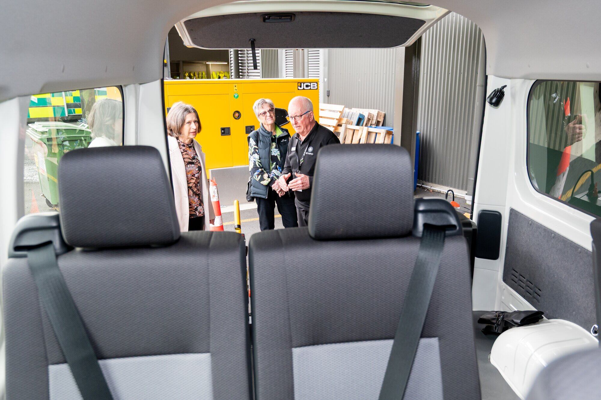  Hato Hone St John dignitaries, operations staff, and Mackay Strathnaver Trust representatives check out the new Waka Ora Health Shuttle. Photo / Brydie Thompson