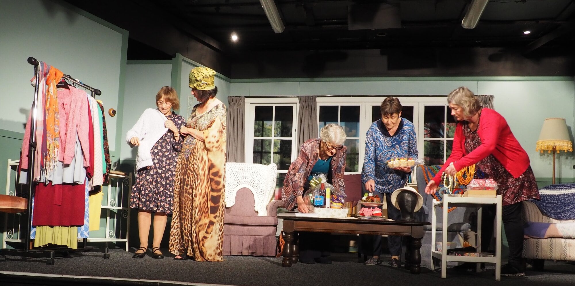 Di Leach (centre) on stage with some of the cast from 'Call Girls', a play set in a retirement home. Photo / Supplied