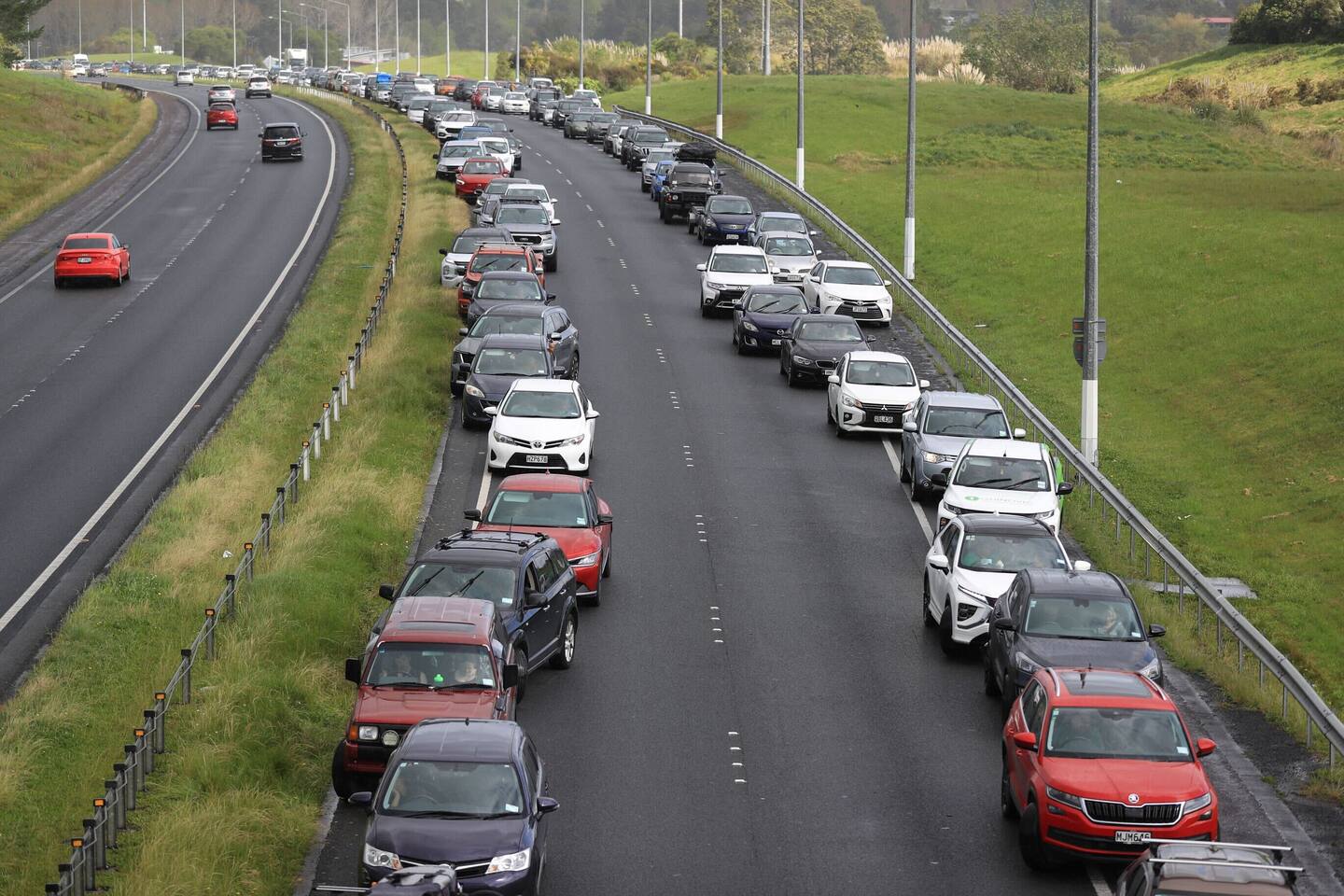 NZTA Waka Kotahi said the motorway reopened about 7.15pm. Photo / Hayden Woodward