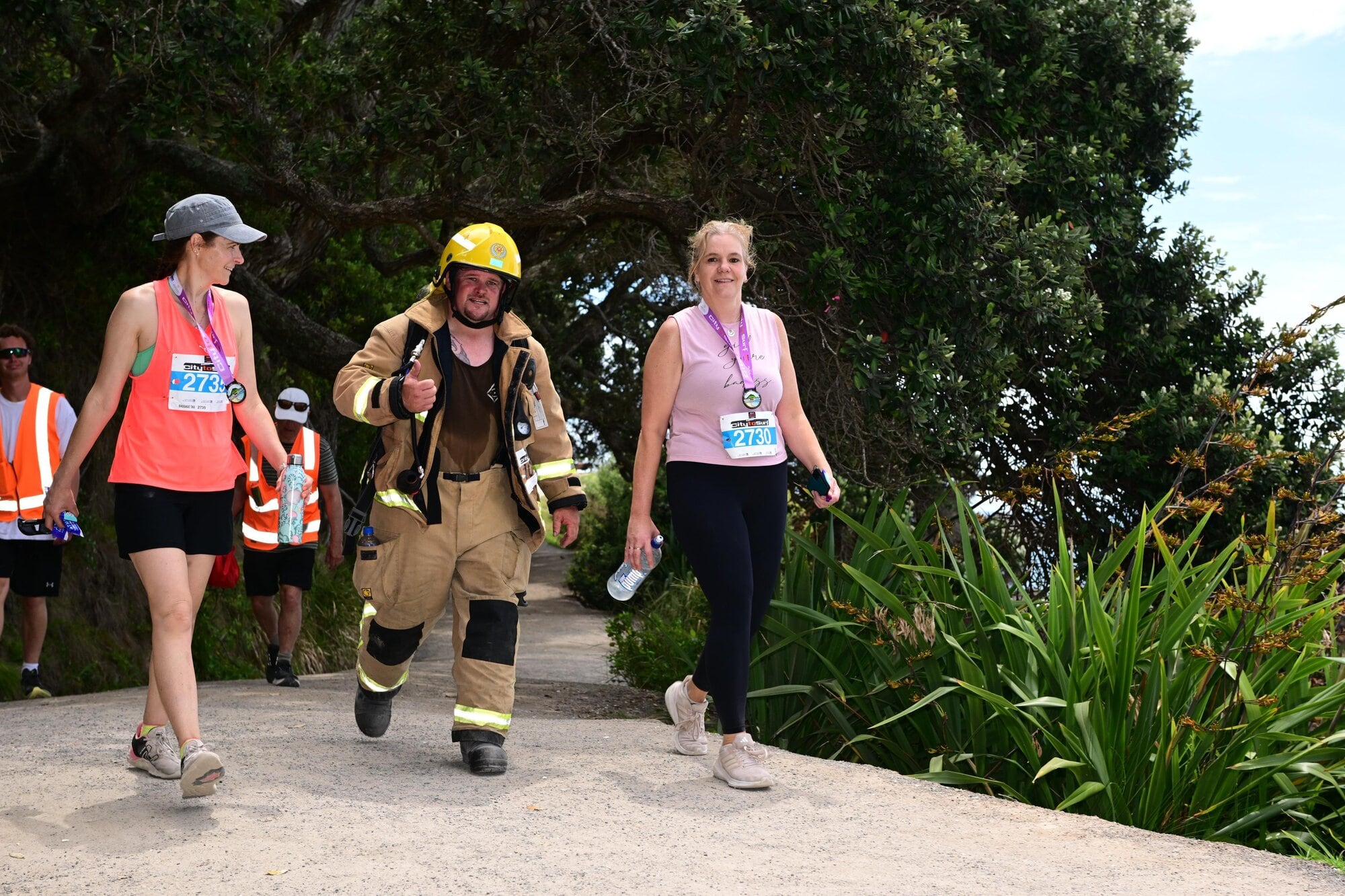  Volunteer firefighter Chris Reid completed Tauranga's City to Surf fun run and walk in full firefighting kit last year. Photo / Marathon Photos Live