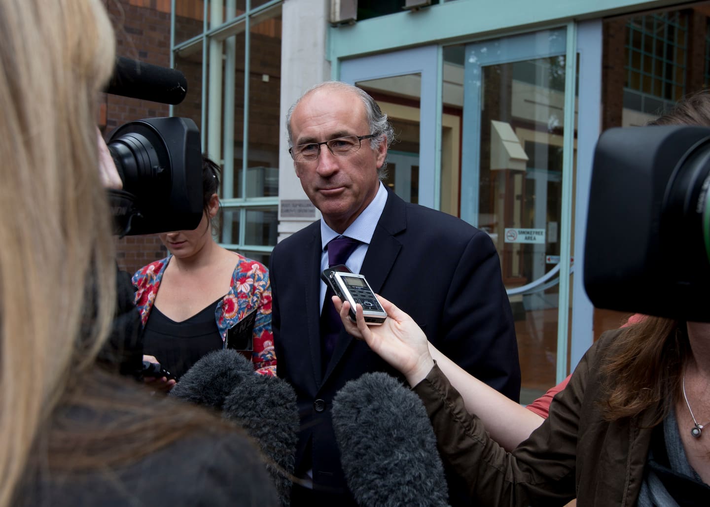 Paul Davison, KC, leaving the High Court in Auckland in 2013, when he was acting as Kim Dotcom's counsel and was a Queen's Counsel. Photo / Brett Phibbs