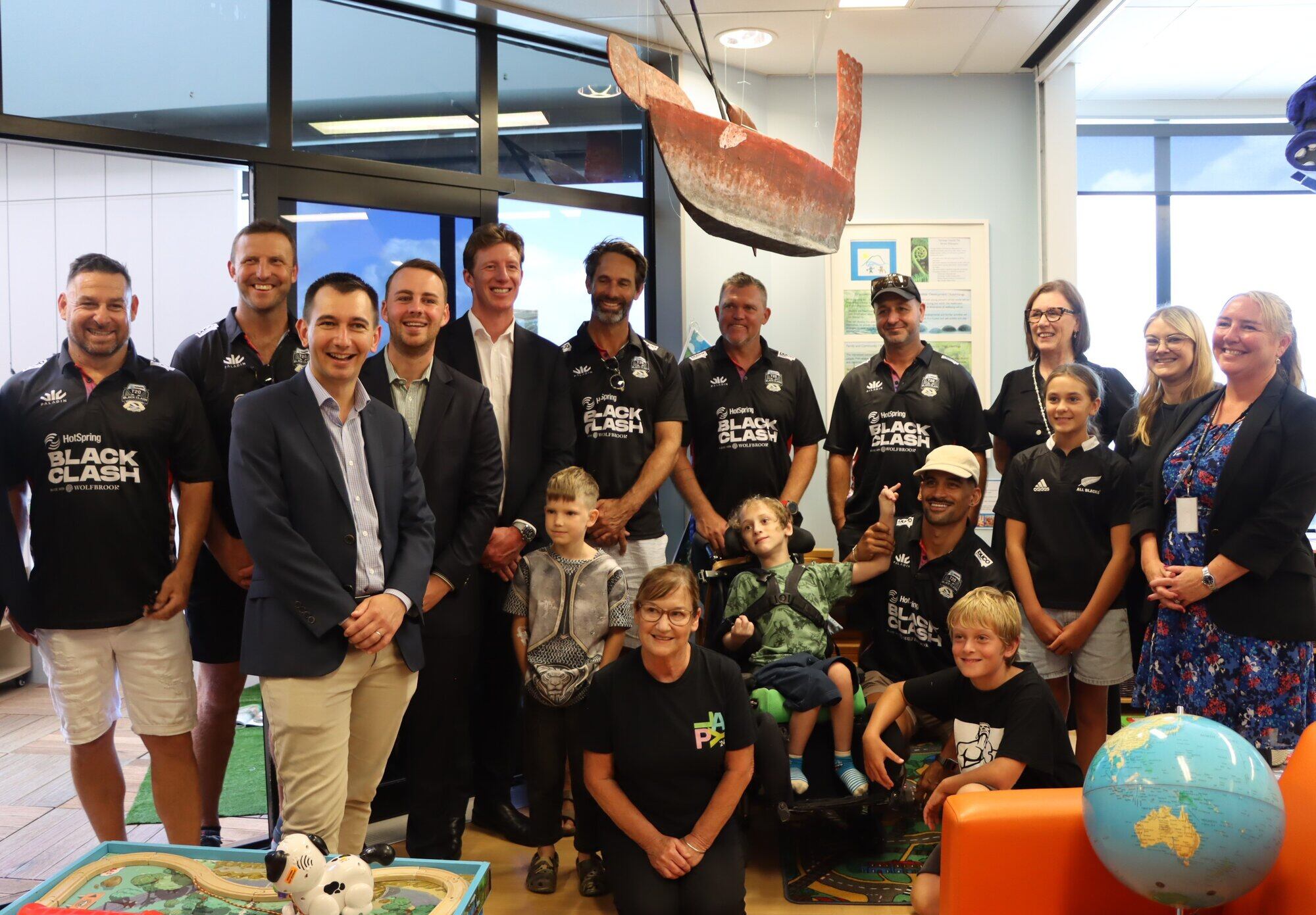 Black Clash players and MPs visiting some of the patients in Tauranga Hospital's children's ward. Photo / Bijou Johnson