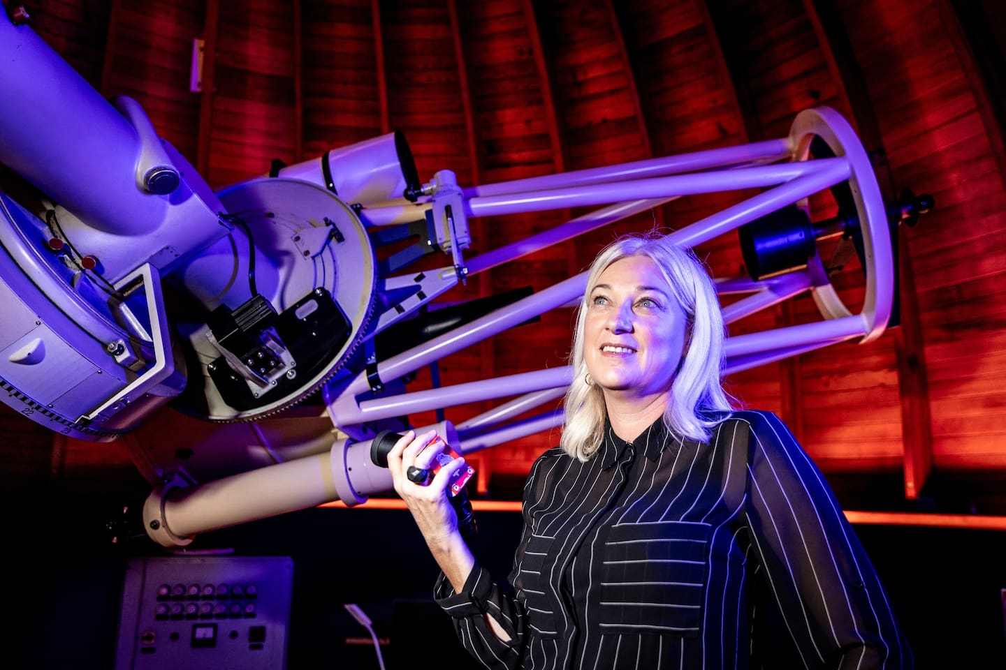 Victoria Travers, Chief Executive Stardome Observatory and Planetarium with the WEB Zeiss telescope. Photo / Michael Craig