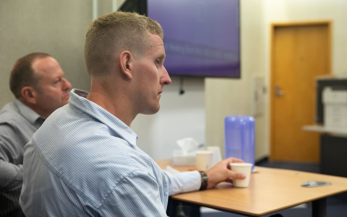 Olivia Podmore's brother Mitchell Podmore (front) and their father Phil at the inquest. Photo / Pool