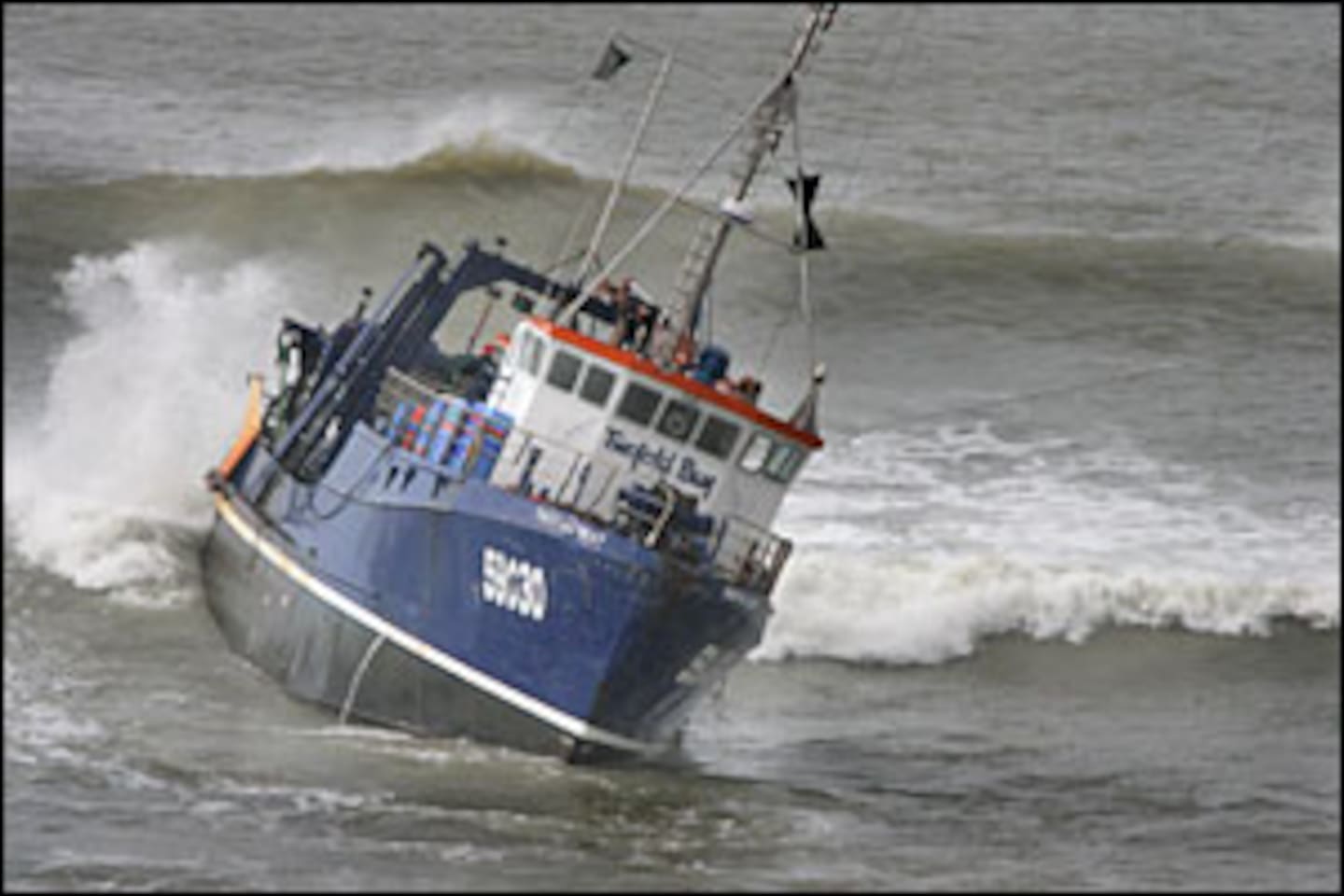 The Twofold Bay trawler lies damaged on rocks in a storm near Mahia in 2006. It is currently kept in Napier's inner harbour. Photo / Warren Buckland