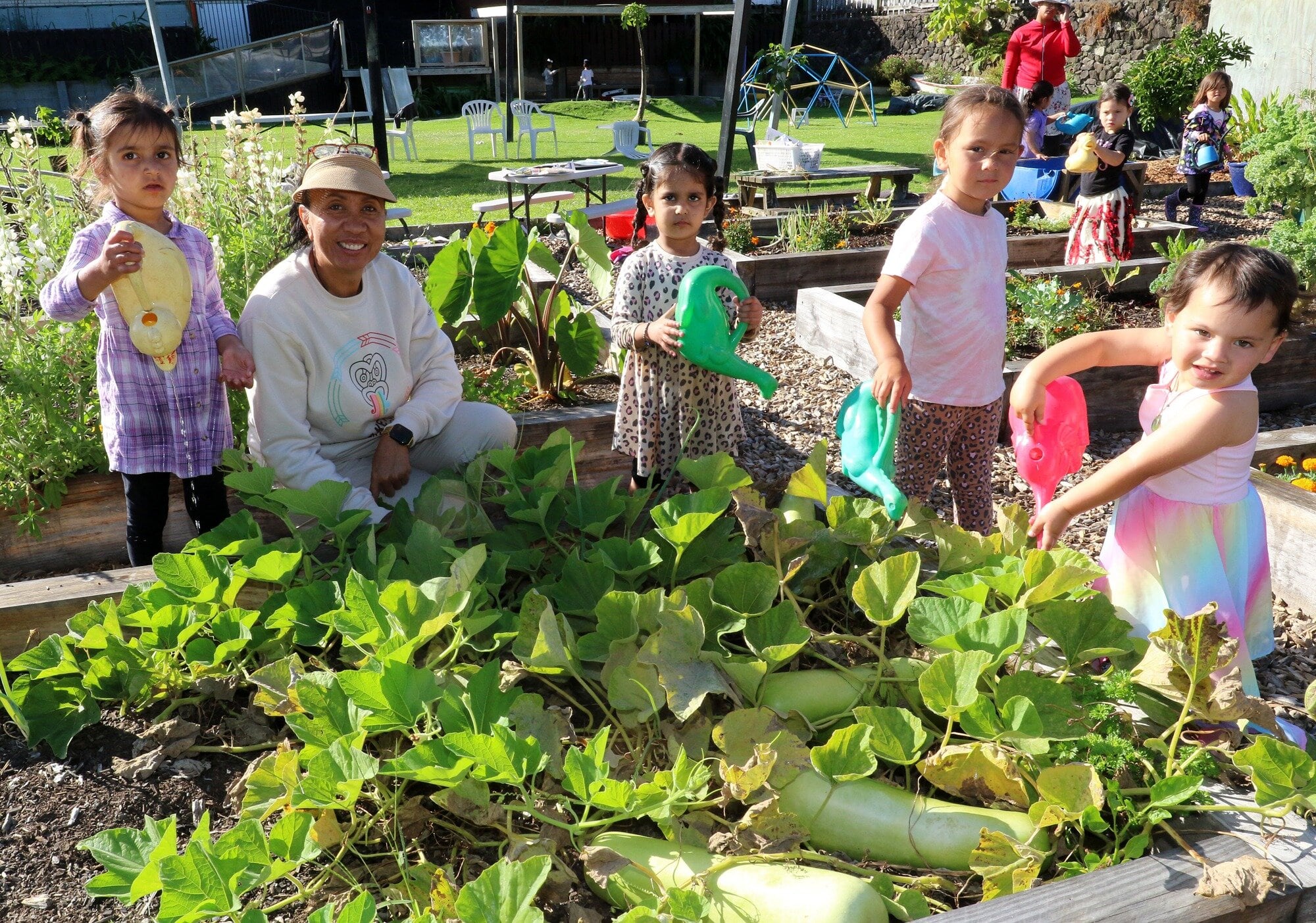  Keeping the vegetable gardens at Giggles Early Learning centre watered with centre owner Shona Ua-Marsh. Photo / Stuart Whitaker