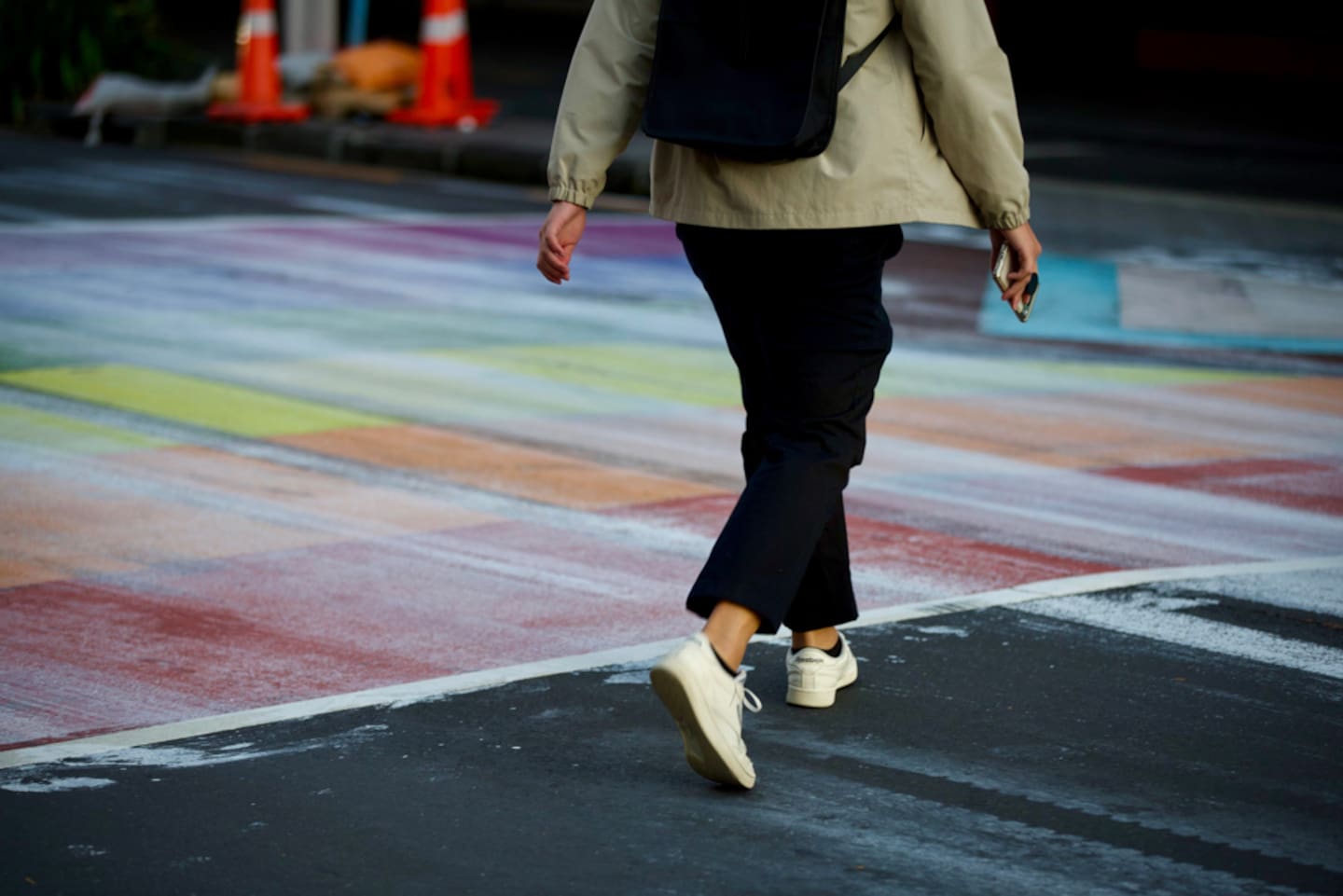 The rainbow crossing on Karangahape Rd is still visible after being covered with white paint overnight. Photo / Michael Craig
